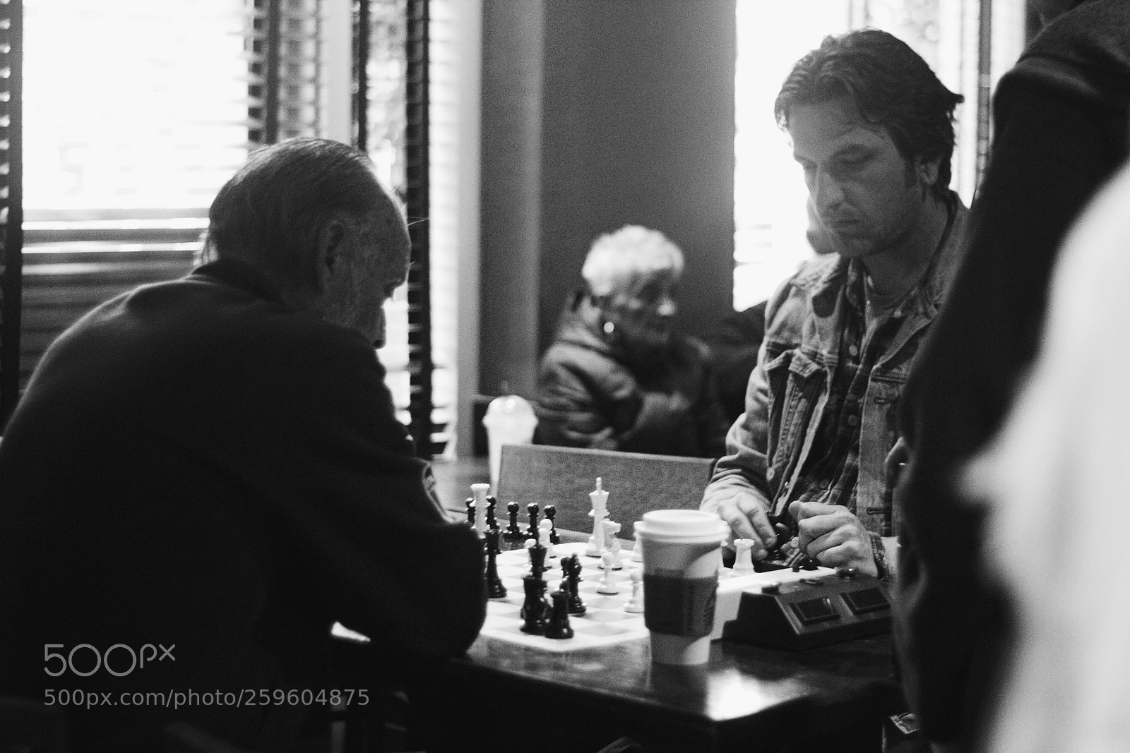 Canon EOS 1200D (EOS Rebel T5 / EOS Kiss X70 / EOS Hi) sample photo. Conversations in a diner photography