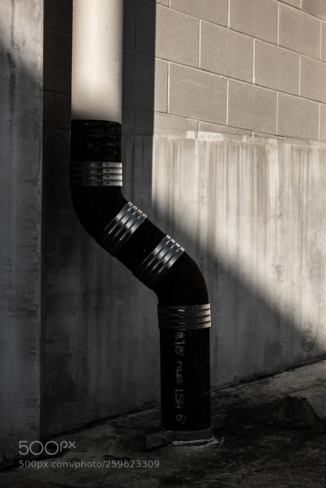 Canon EOS 1100D (EOS Rebel T3 / EOS Kiss X50) sample photo. Parking garage pipe photography