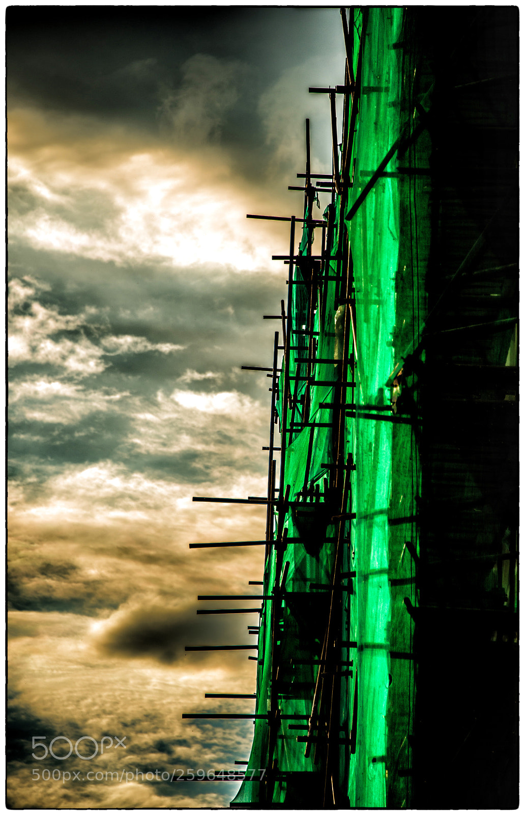 Nikon D750 sample photo. Green facade and clouds photography