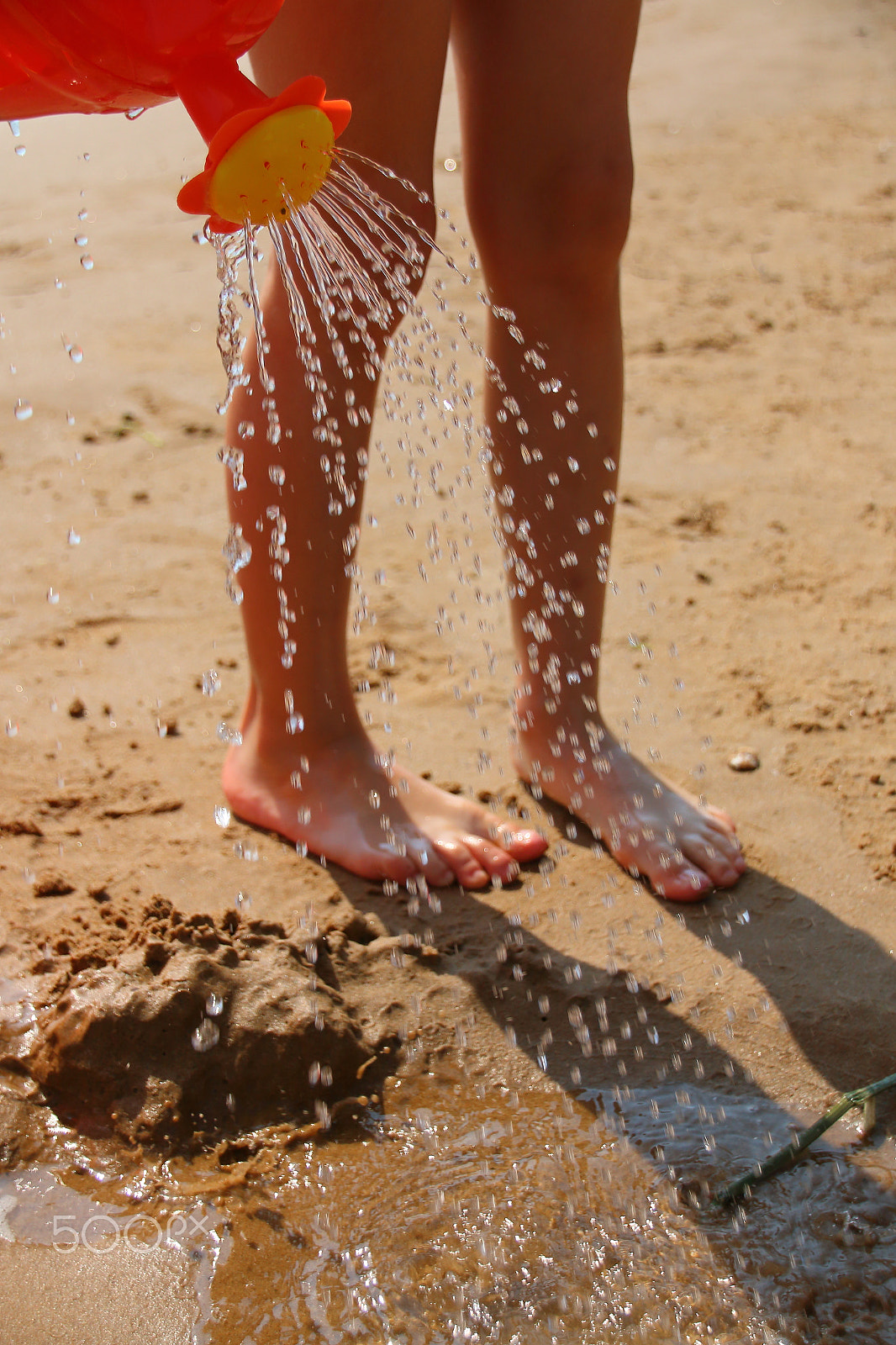 Canon EOS 70D sample photo. Little girl plays with the watering can on the bea photography