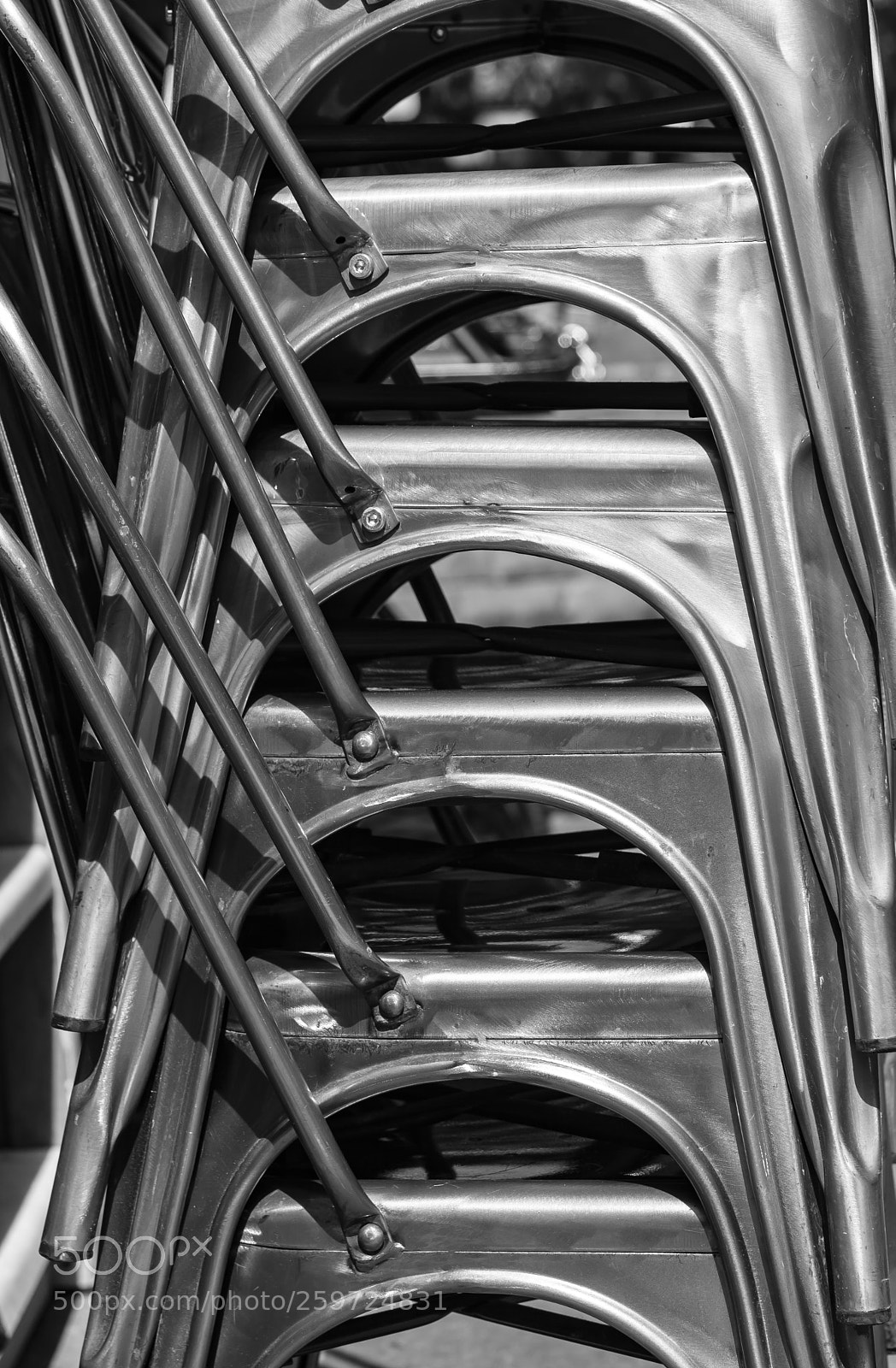 Canon EOS 5D Mark II sample photo. Stacked metal chairs photography