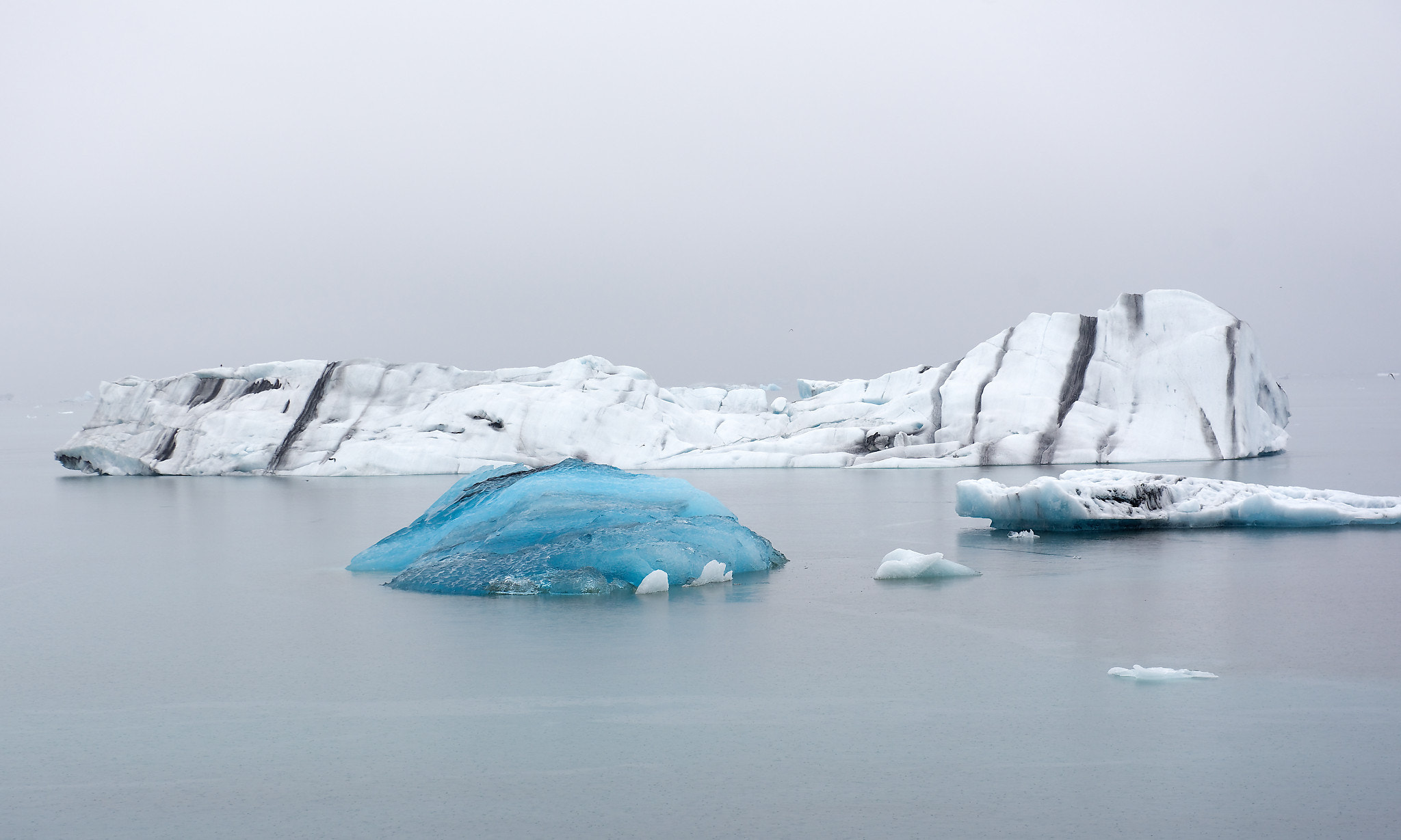 Nikon AF-S Nikkor 24-70mm F2.8G ED sample photo. Blue ice cap in glacier lagoon photography