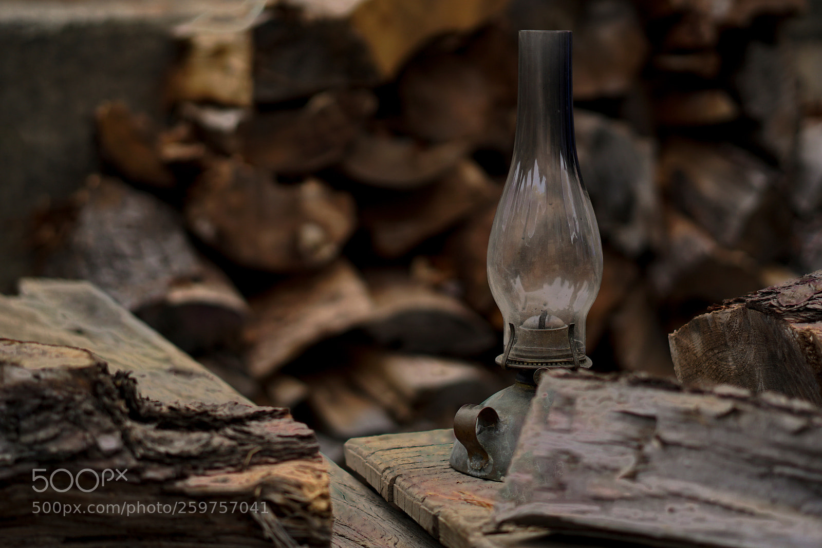 Sony a6500 sample photo. Oil lamp and firewoods photography
