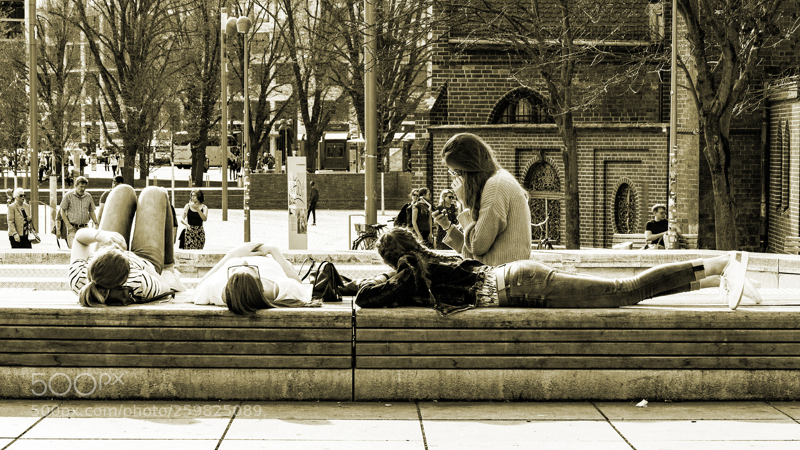 Sony ILCA-77M2 sample photo. Sunbathe in the city photography