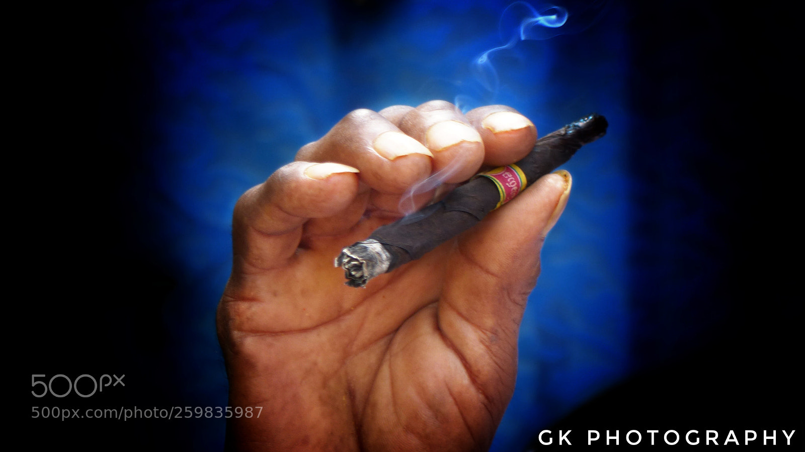 Panasonic Lumix DMC-FZ200 sample photo. Old man's cigar. photography