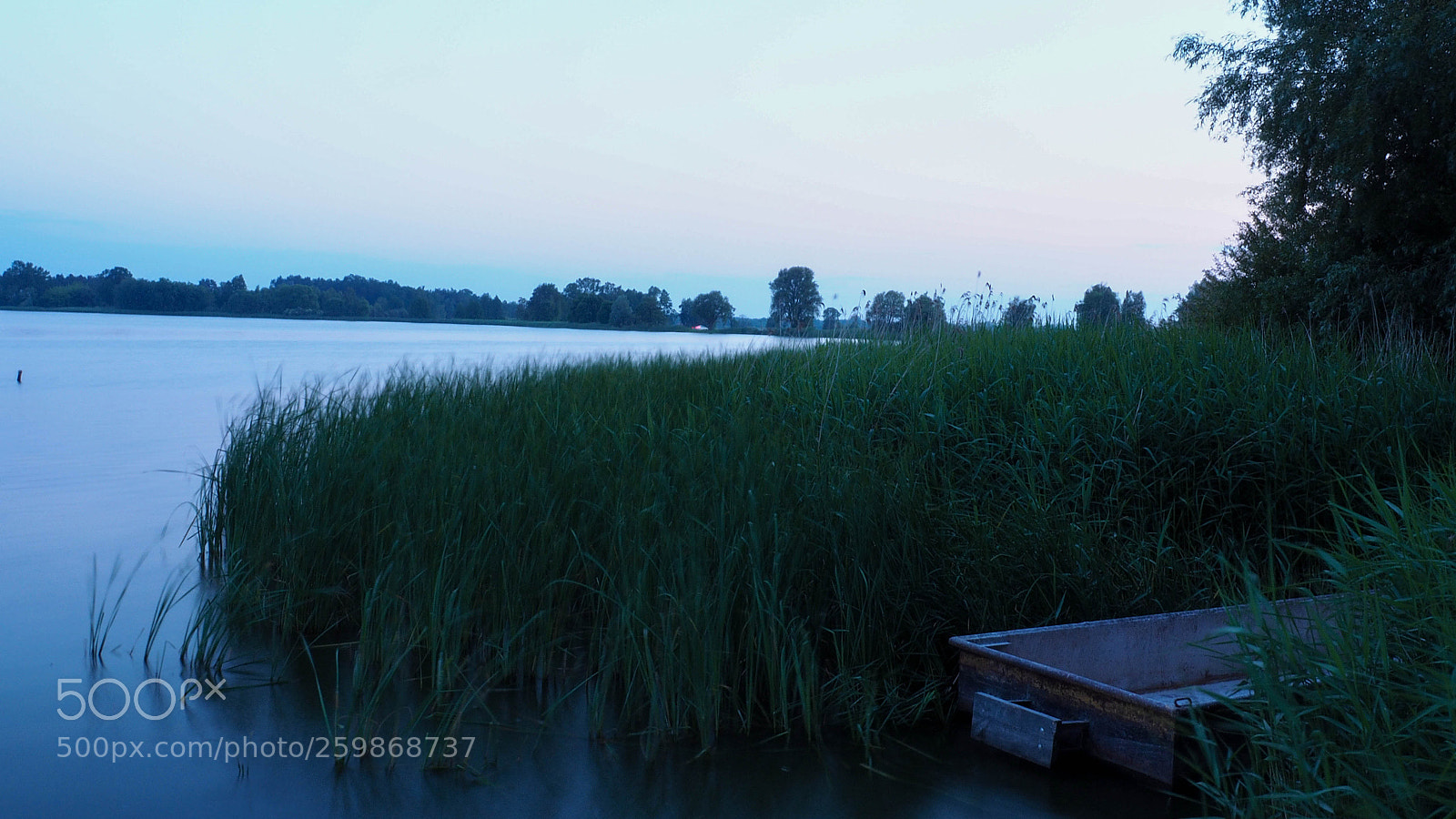Olympus OM-D E-M10 II sample photo. Lonely boat photography