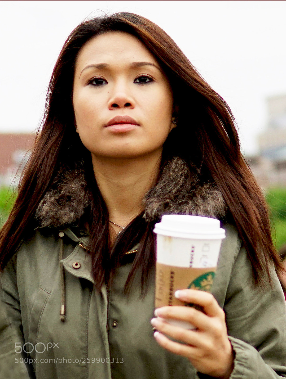 Sony a6500 sample photo. Starbucks in hand photography