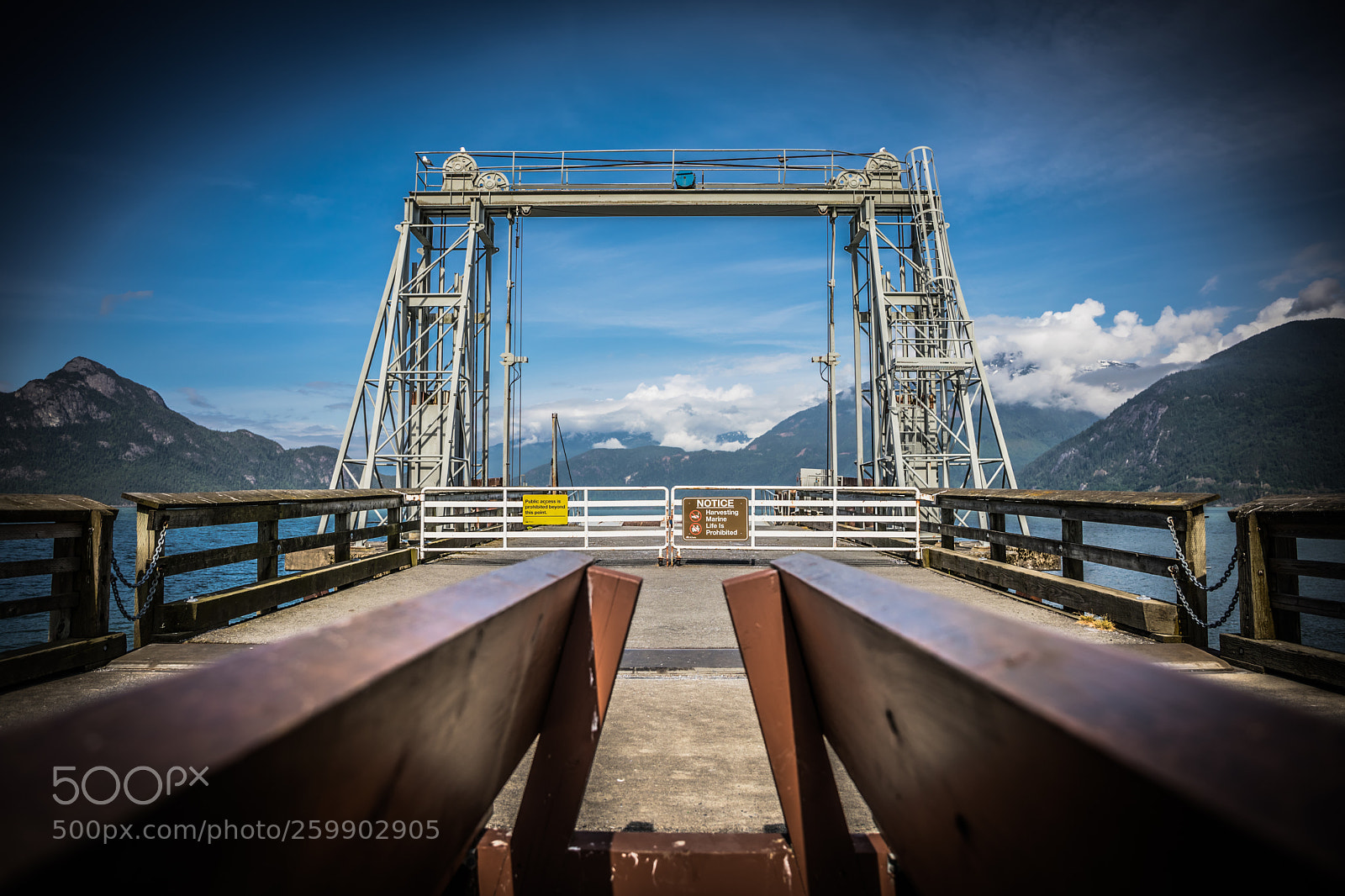 Canon EOS 5D Mark IV sample photo. Mountains through dock photography