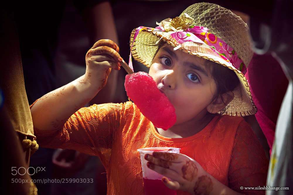 Canon EOS 5D Mark II sample photo. A kid enjoying ice photography
