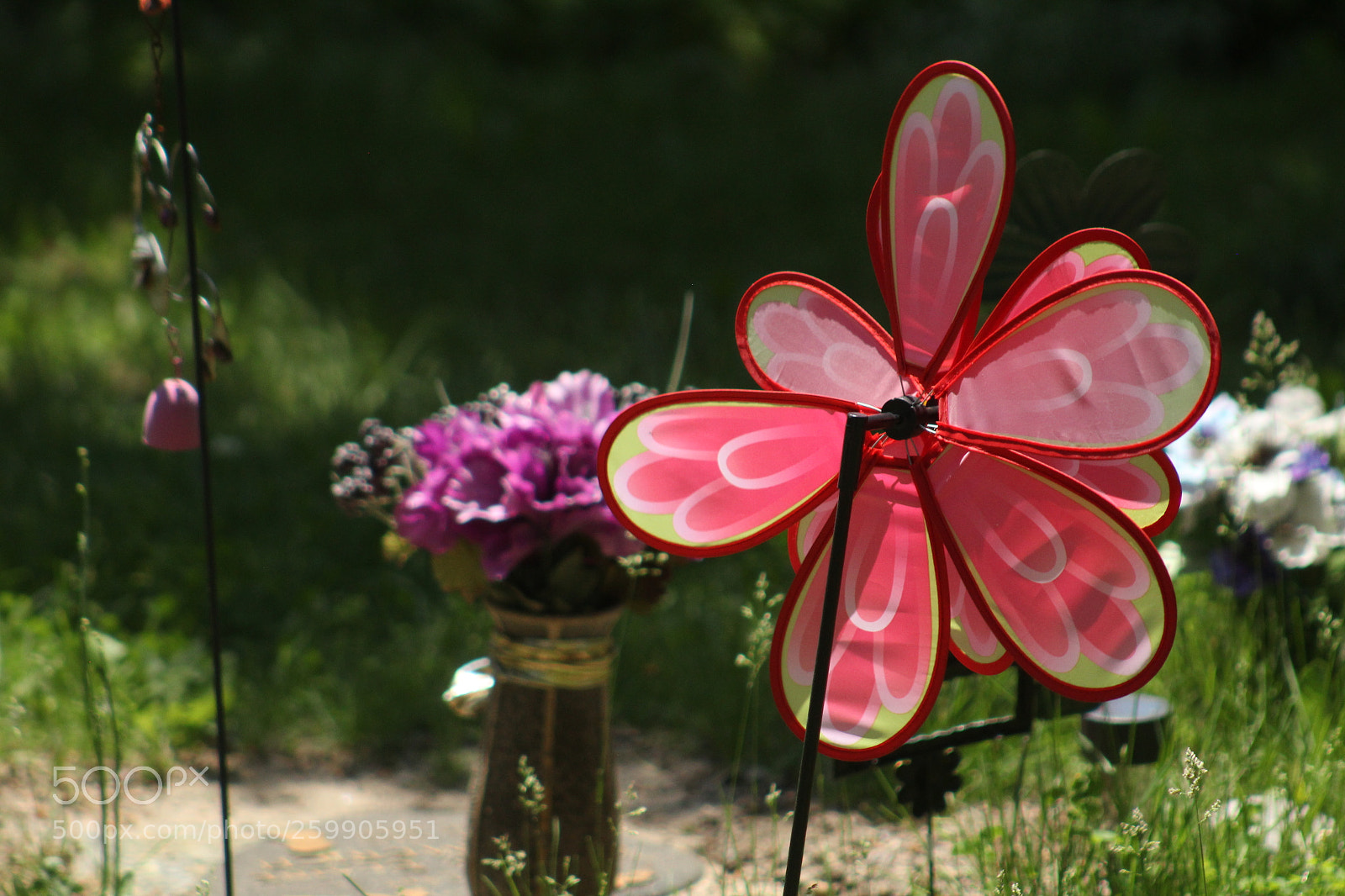 Canon EF 75-300mm f/4-5.6 sample photo. Wind ornament with blurry photography
