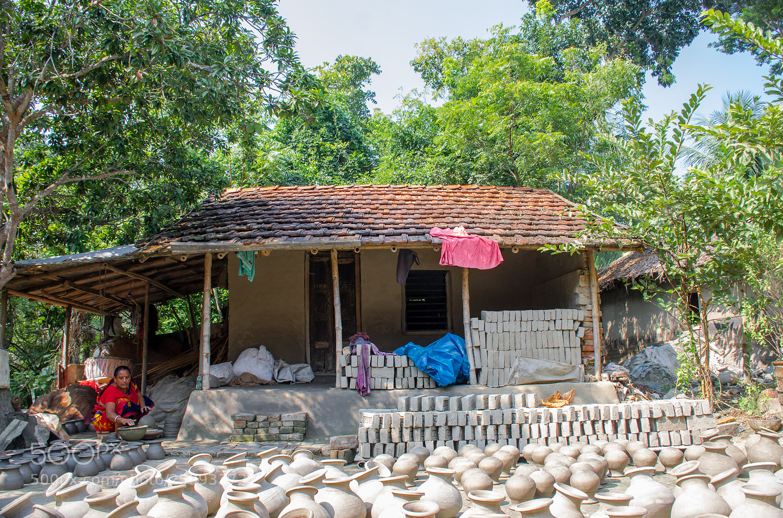 Nikon D7000 sample photo. Soil pot making house photography