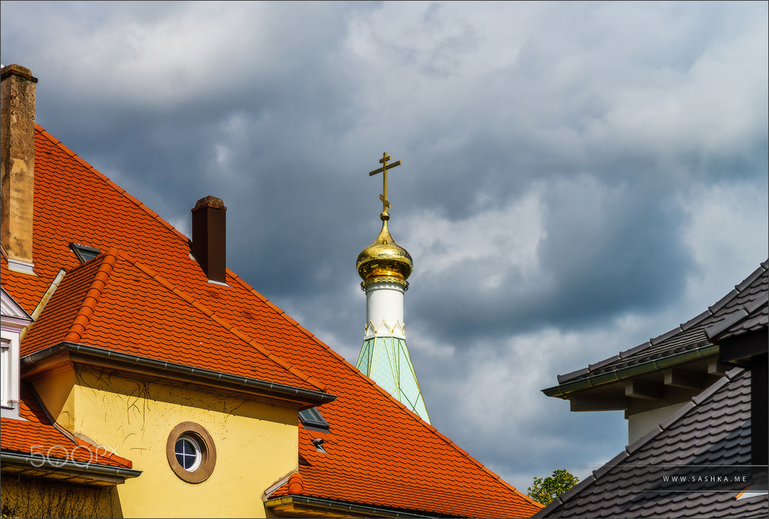 Sony a99 II sample photo. Orthodox russian church cross on stormy sky background photography