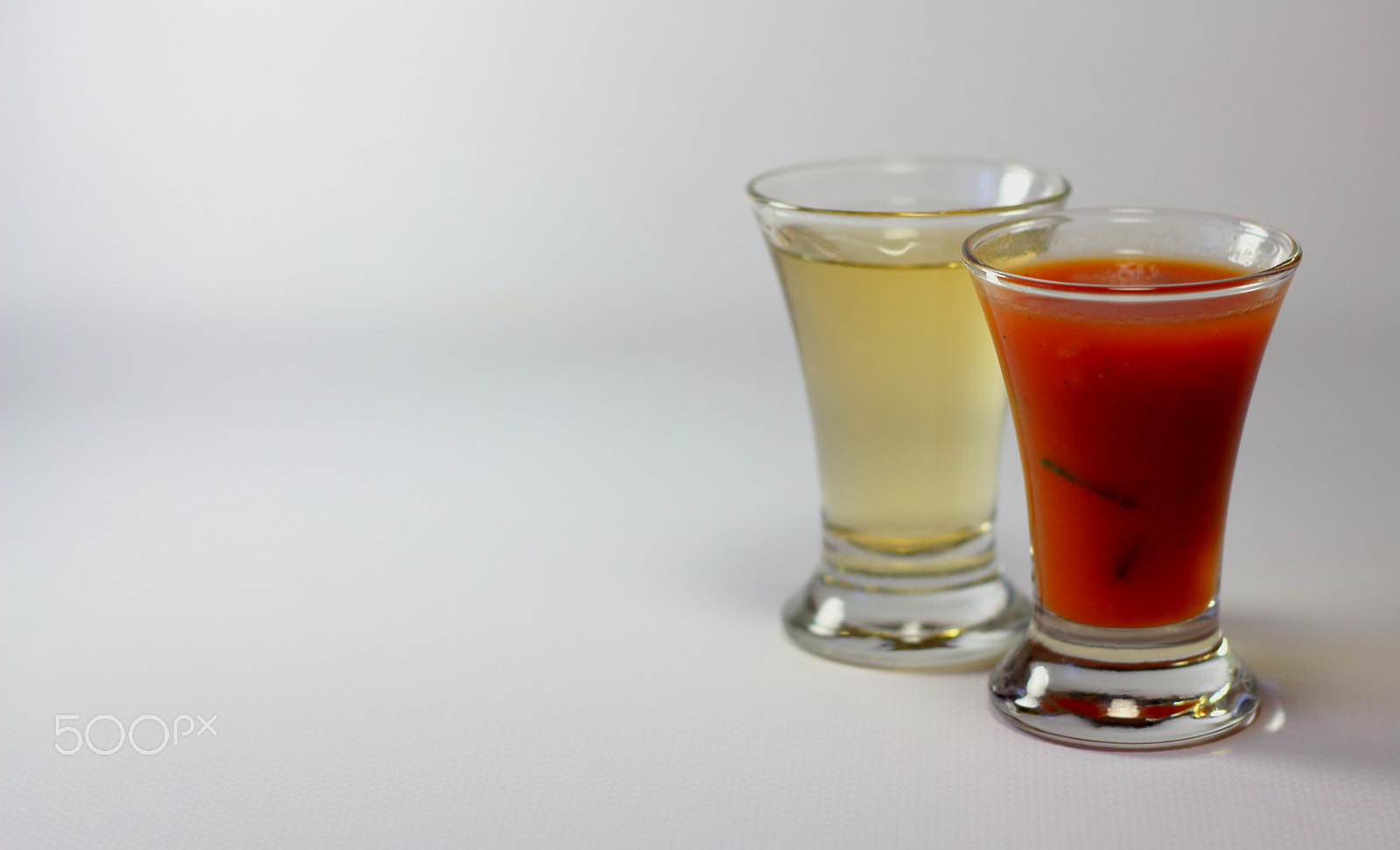 Canon EOS 100D (EOS Rebel SL1 / EOS Kiss X7) + Canon EF 50mm F1.8 STM sample photo. Tequila and sangrita shot glass photography