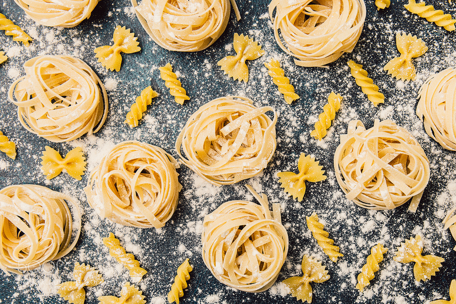 Canon EOS 6D sample photo. Various pasta scattered in photography