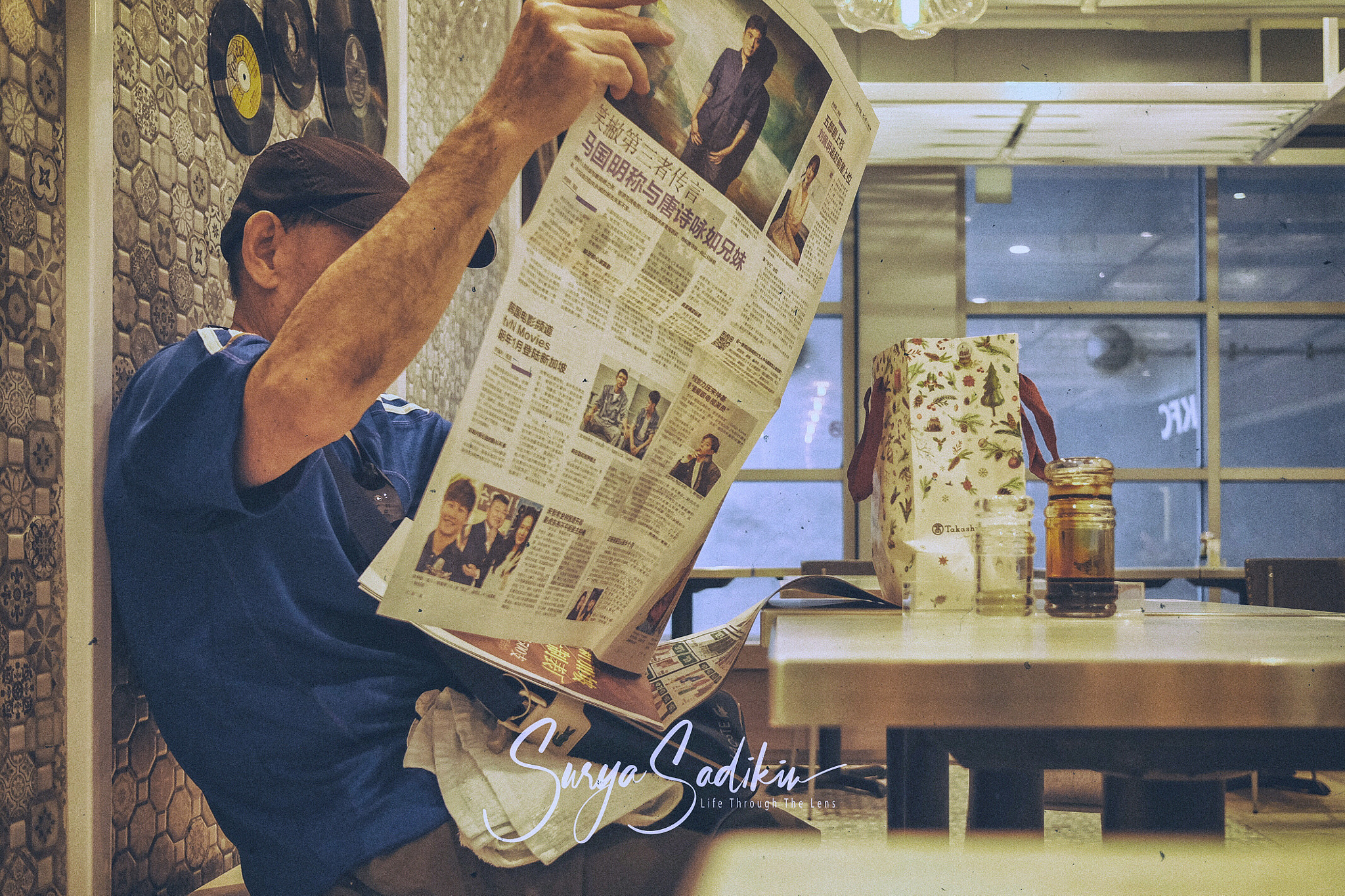 Fujifilm X70 sample photo. Morning newspaper photography