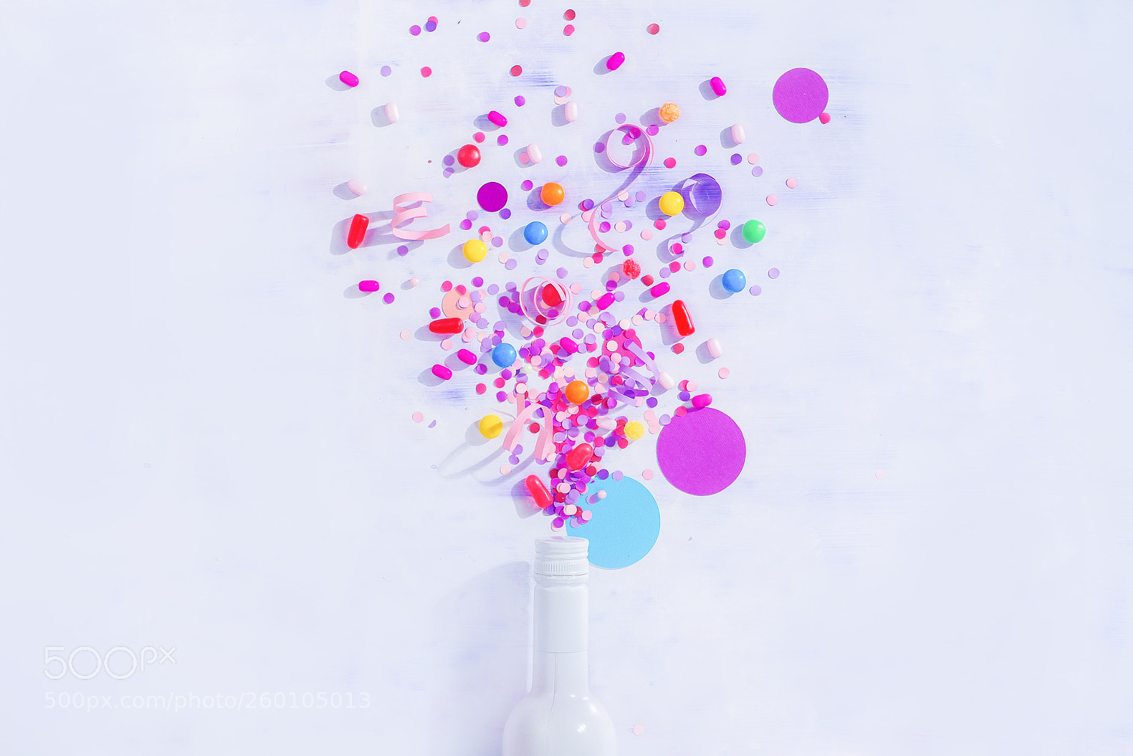 Nikon D800 sample photo. Bottle with bursting confetti photography