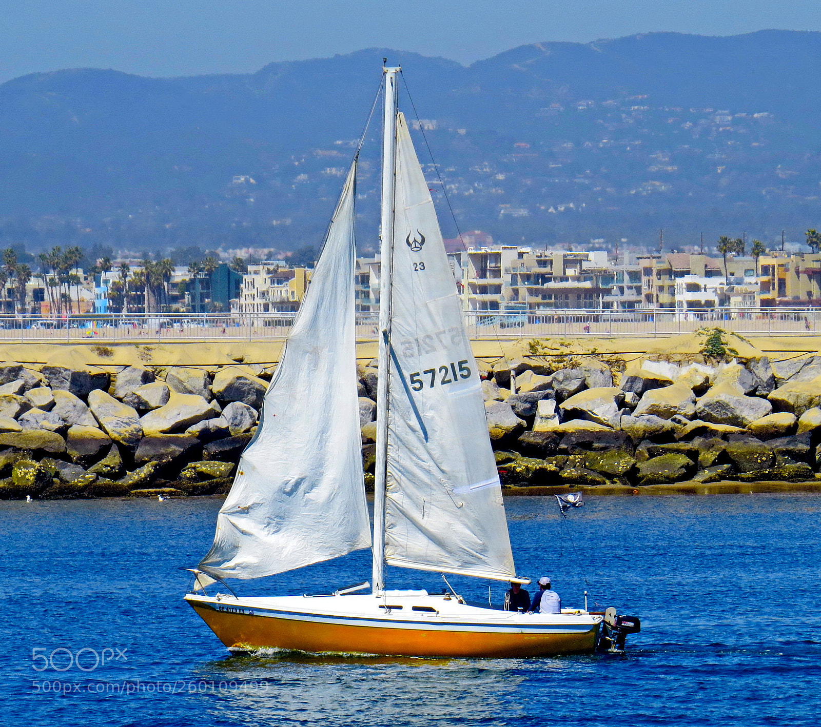 Canon PowerShot SX50 HS sample photo. A gold sailboat in photography
