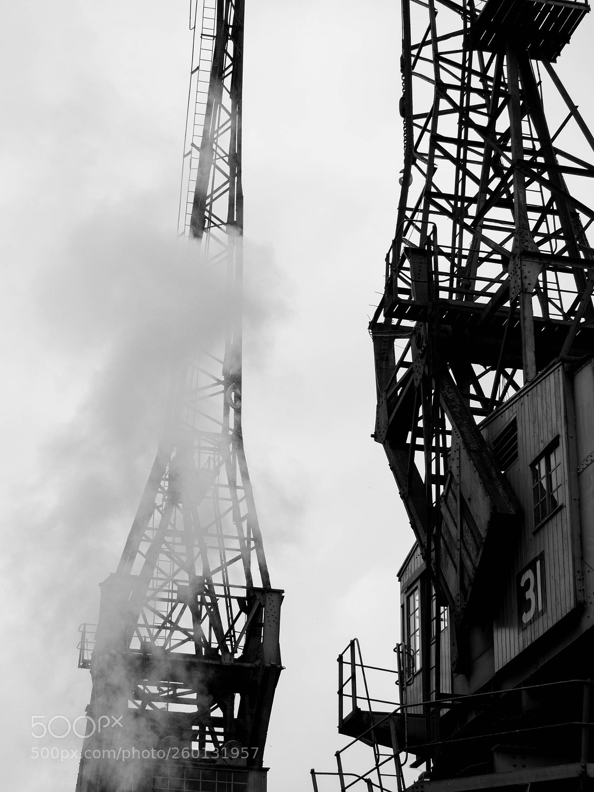 Olympus OM-D E-M10 II sample photo. Cranes on the harbourside photography
