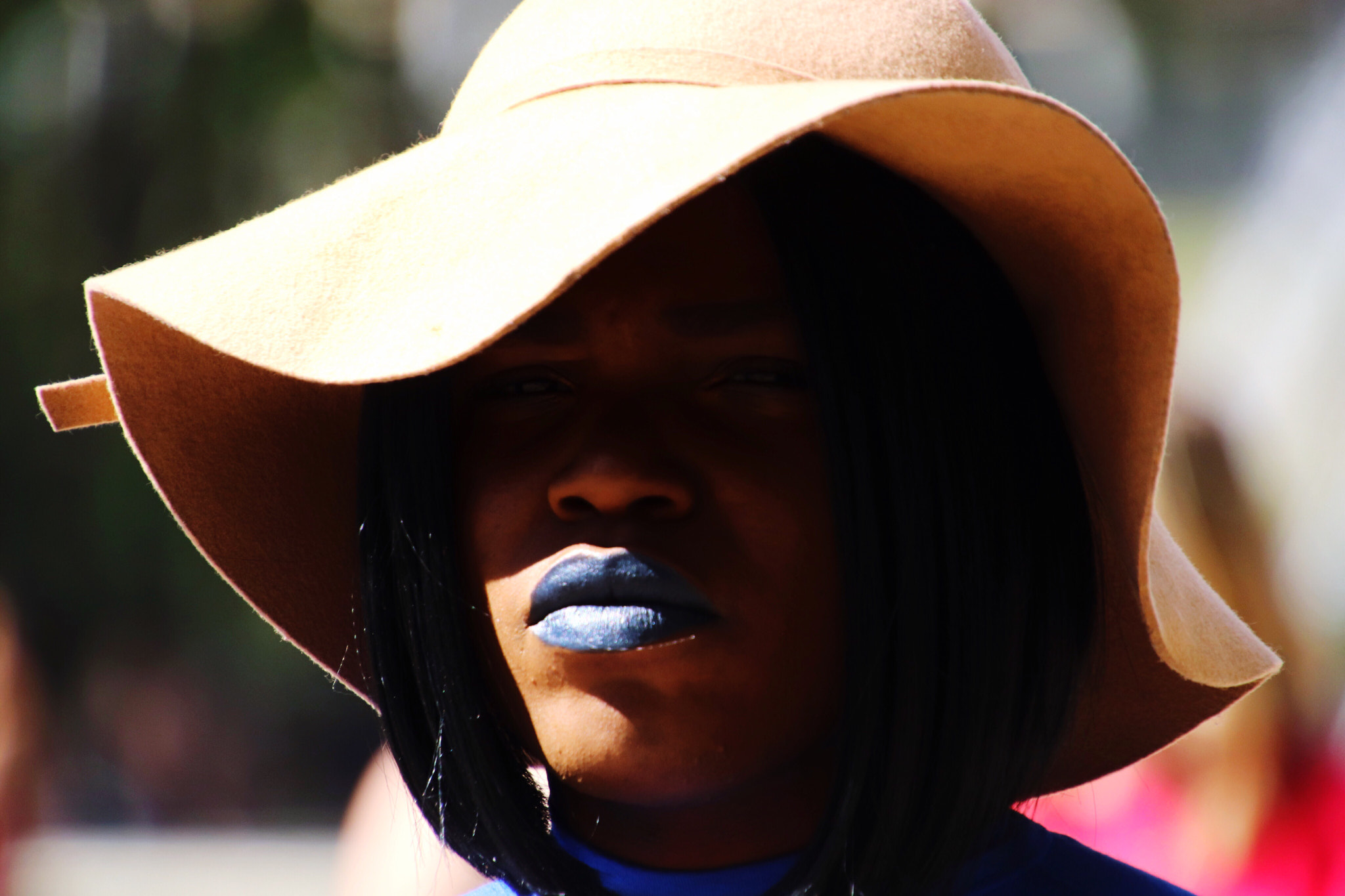 Canon EOS 800D (EOS Rebel T7i / EOS Kiss X9i) sample photo. She wears a deep shade of blue lipsticks. photography