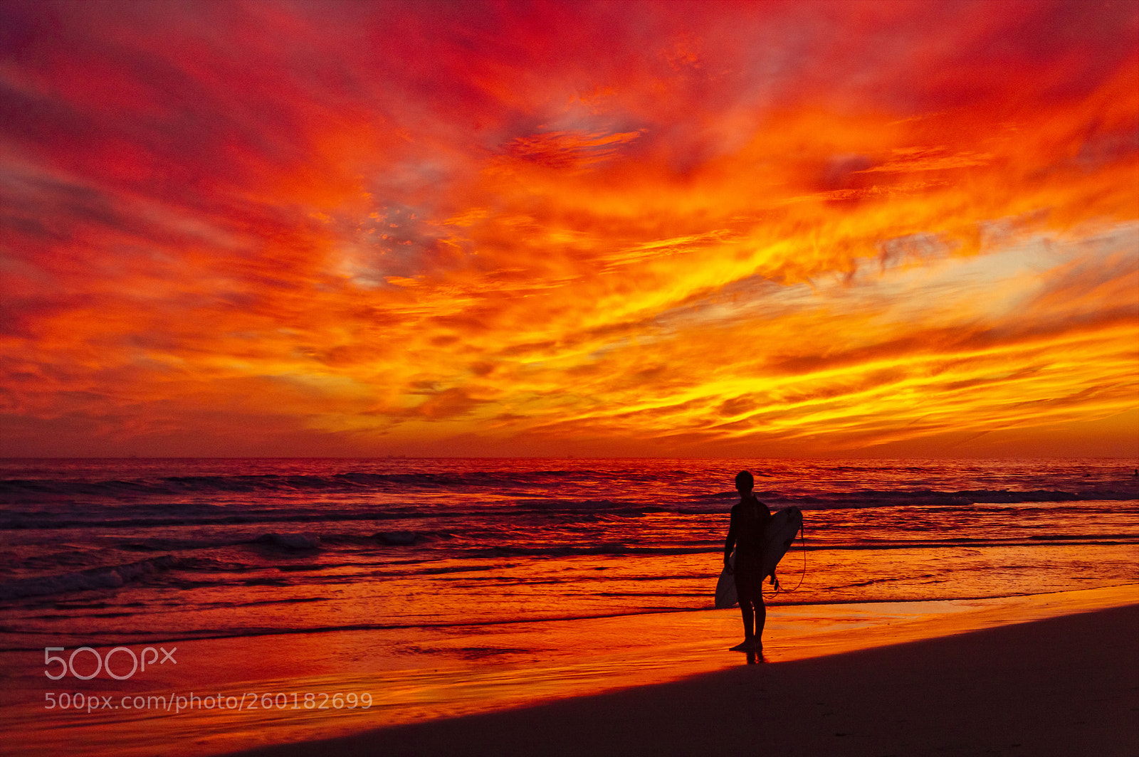Nikon D3200 sample photo. Fiery sunset with surfer photography