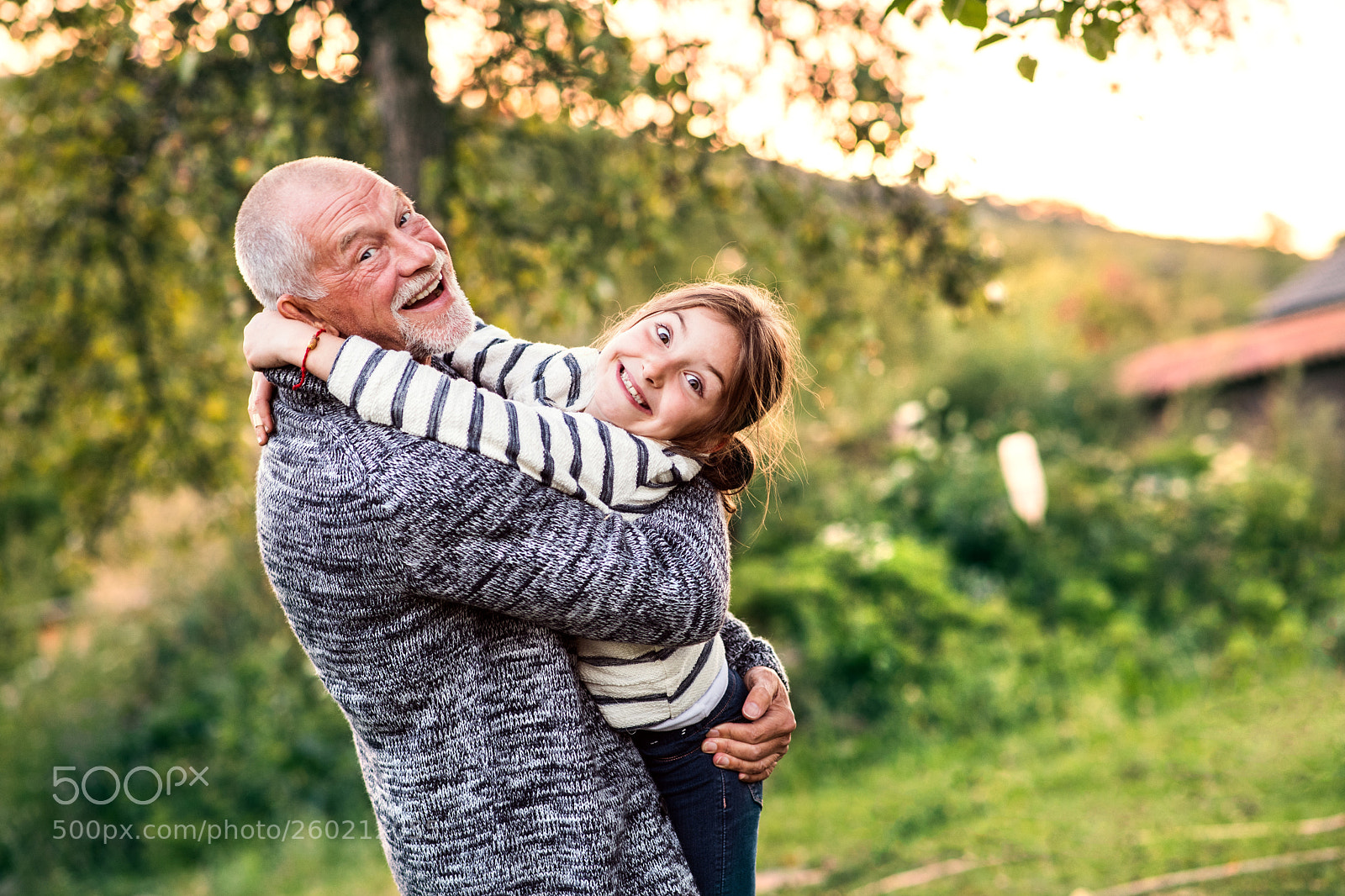 Nikon D5 sample photo. Grandfather giving his granddaughter photography