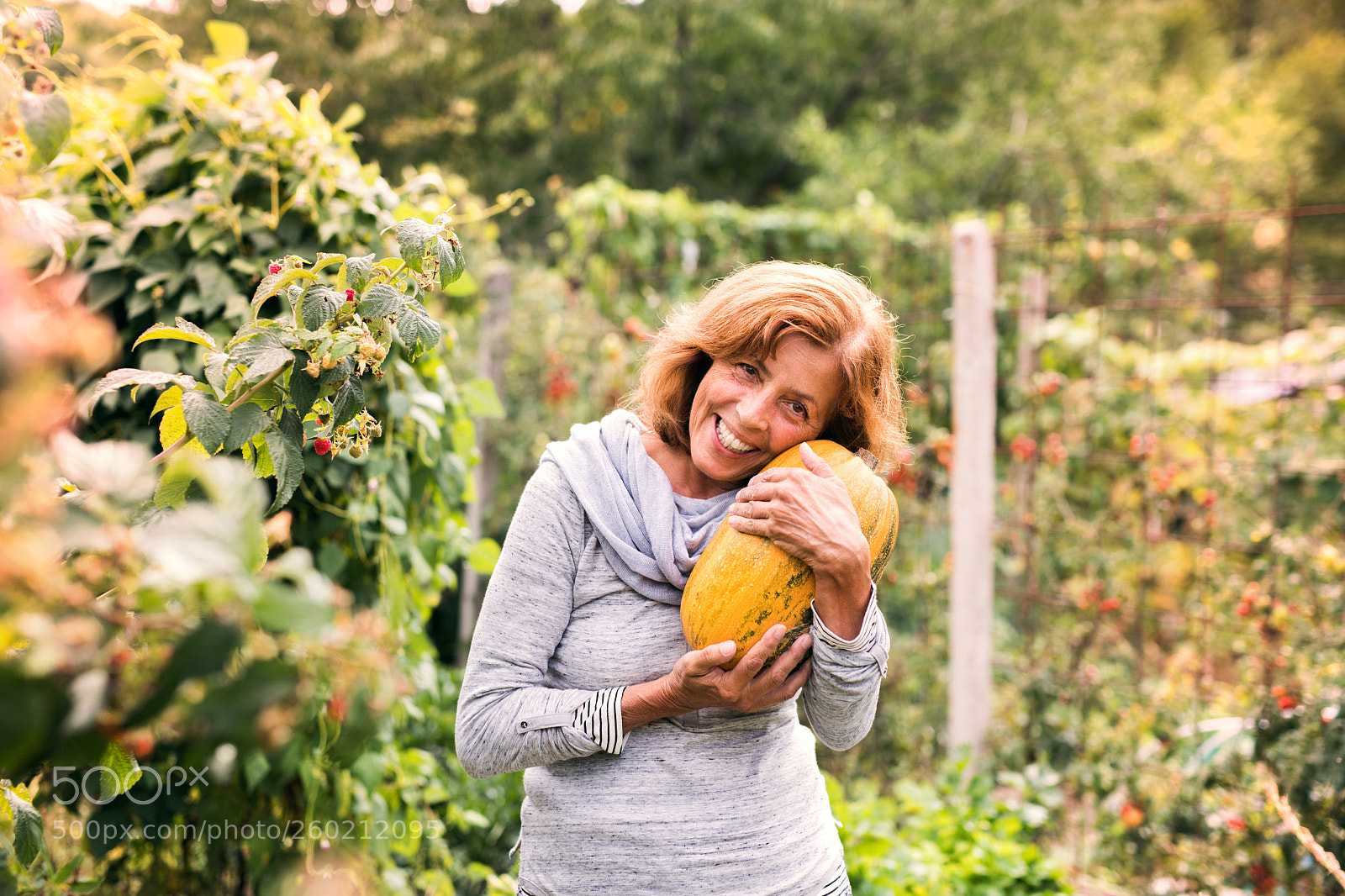 Nikon D5 sample photo. Senior woman gardening in photography