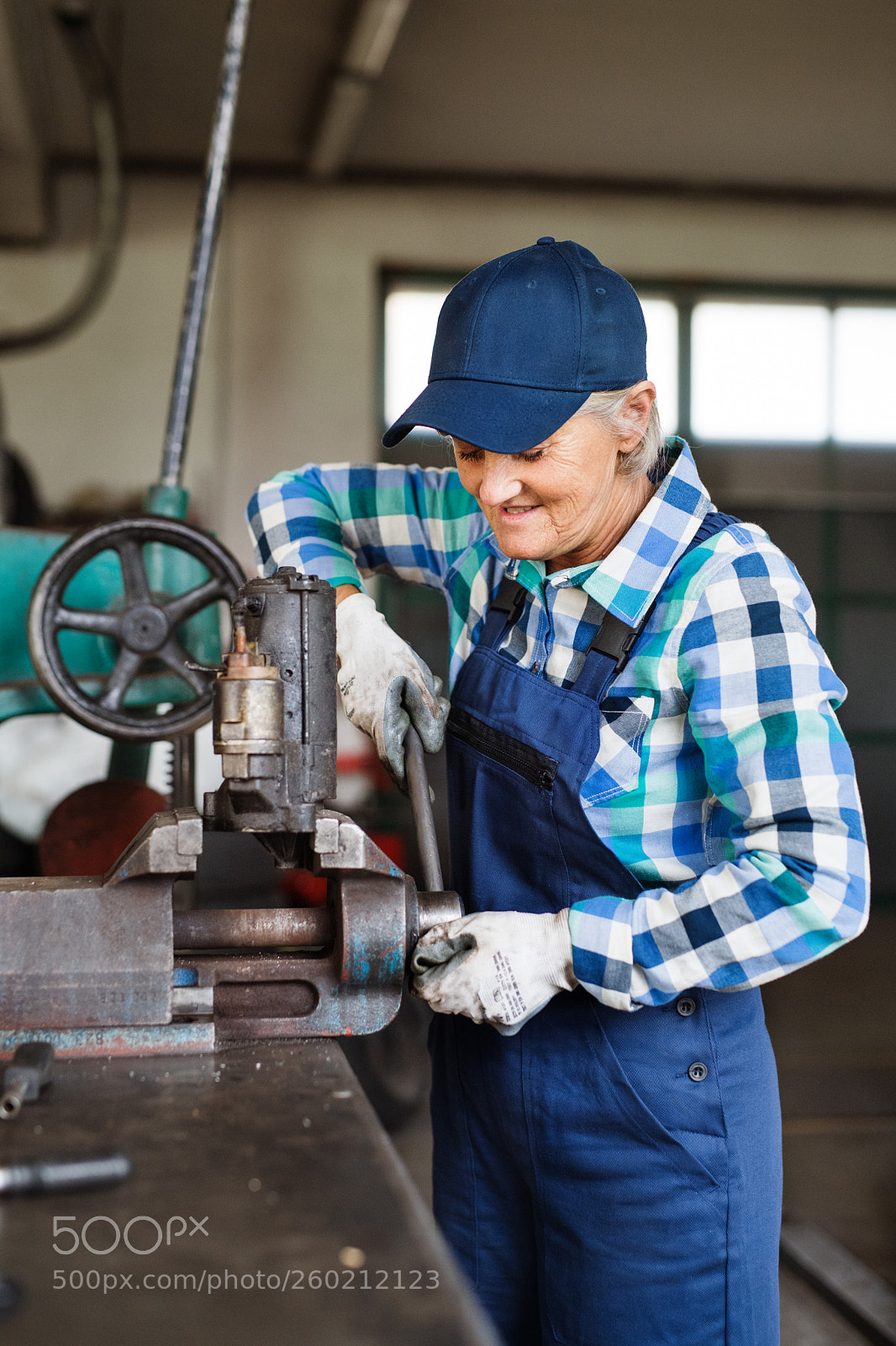 Nikon D5 sample photo. Senior female mechanic repairing photography