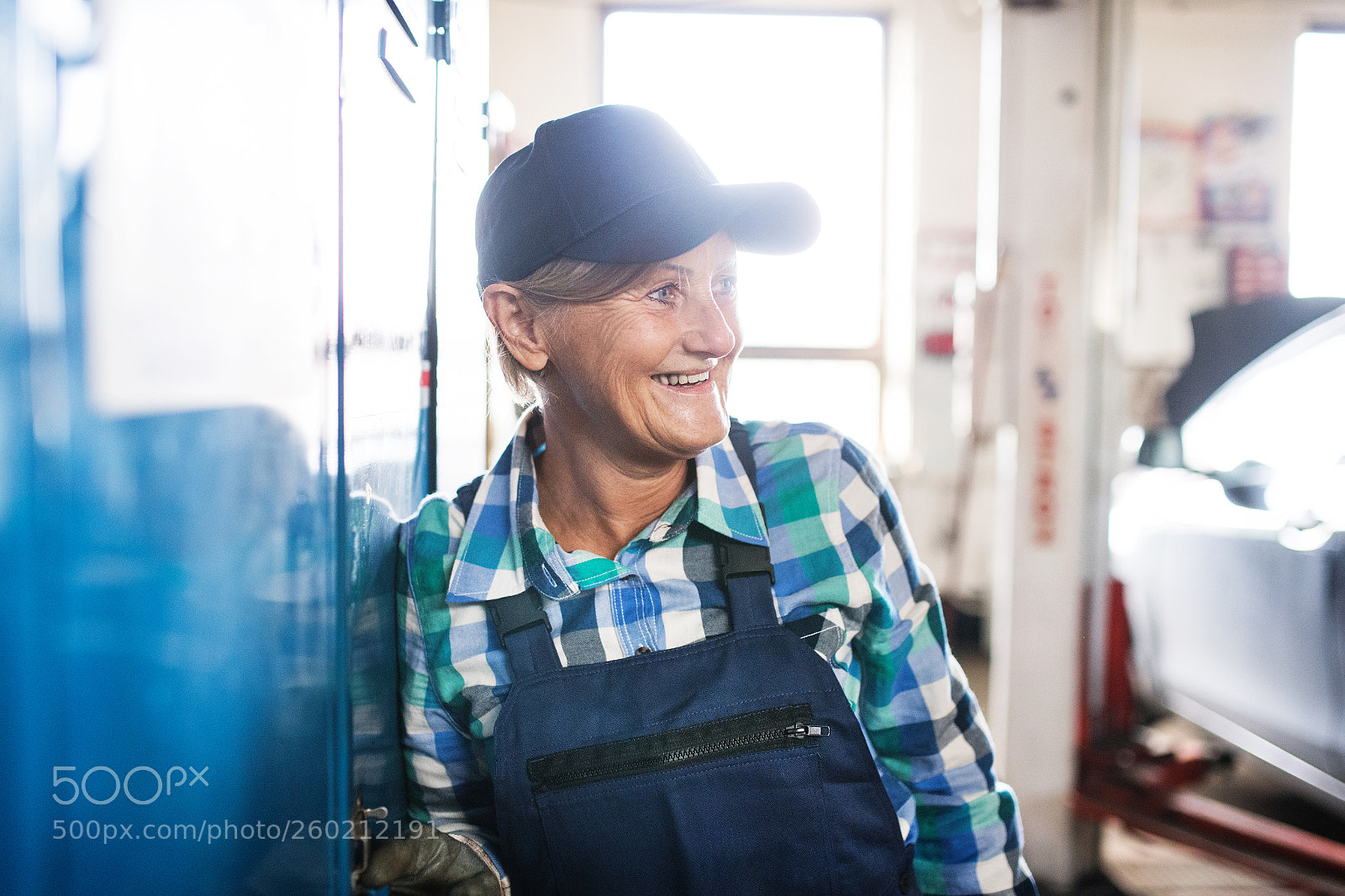 Nikon D5 sample photo. Senior female mechanic repairing photography