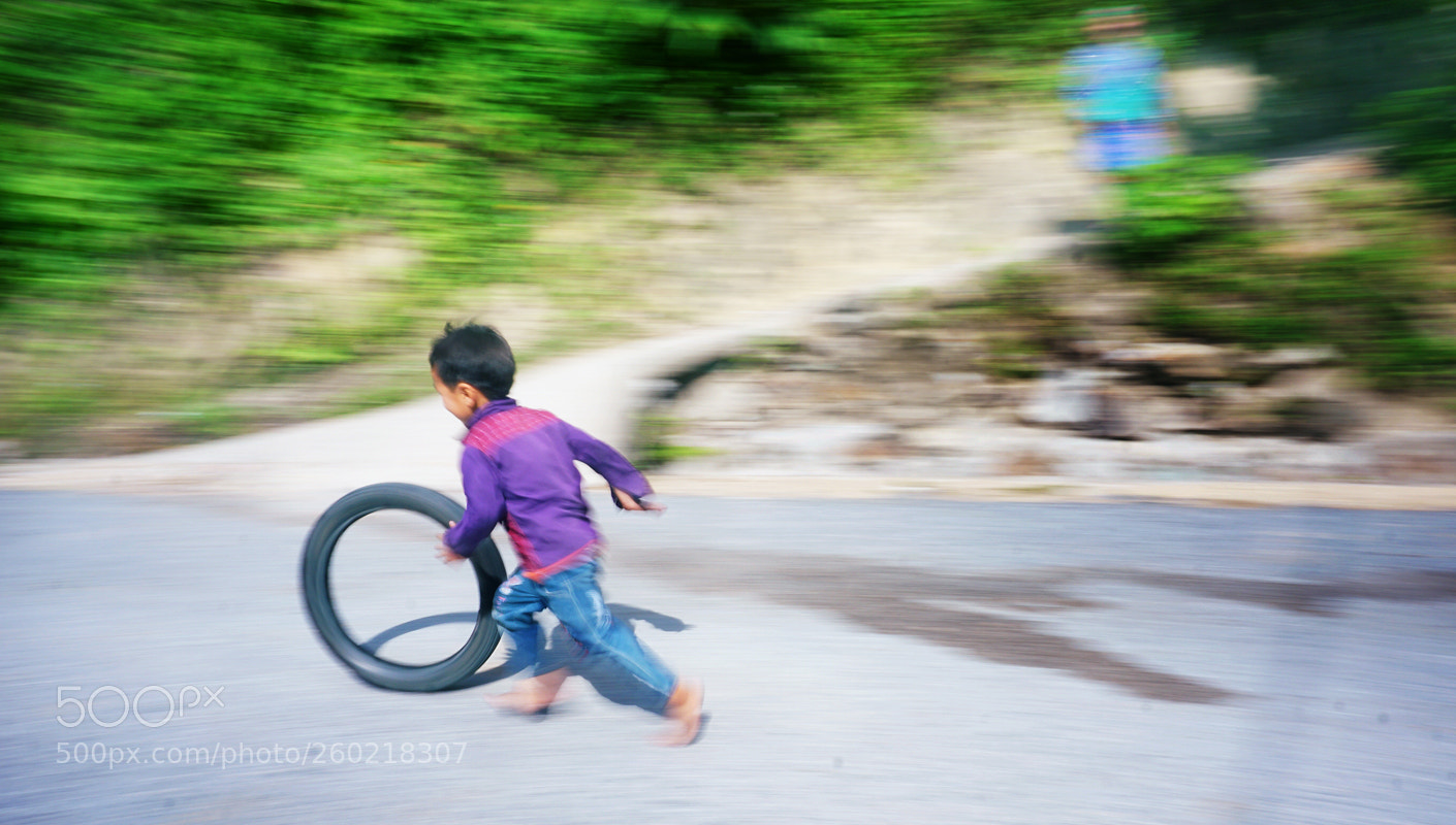 Sony a6000 sample photo. Naive childhood in vietnamese photography