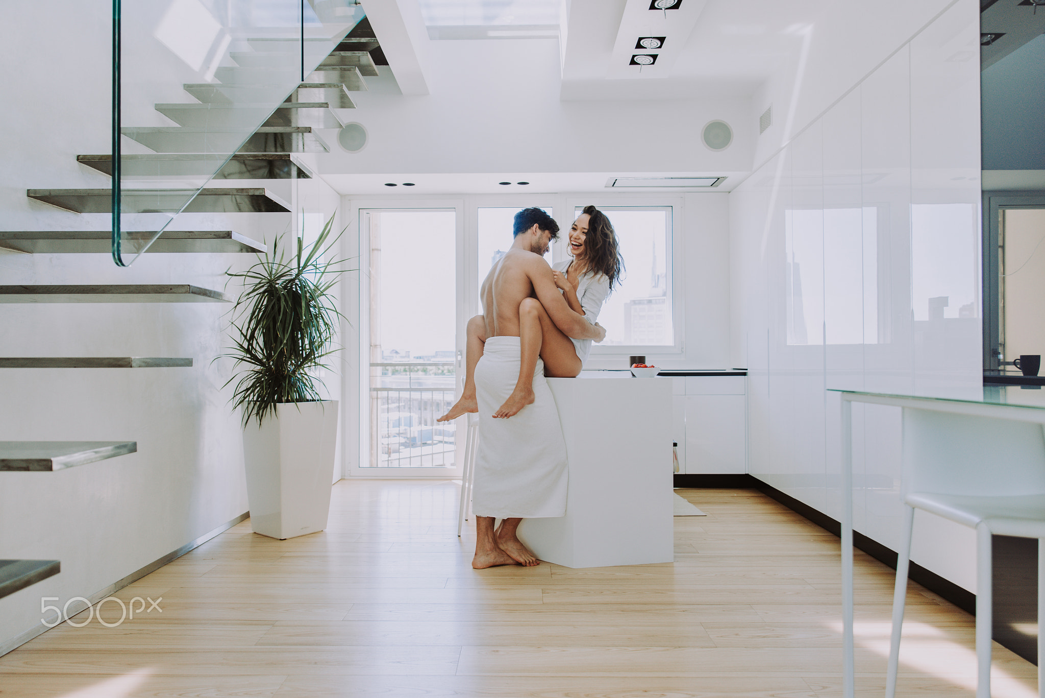 Couple of lovers in a penthouse