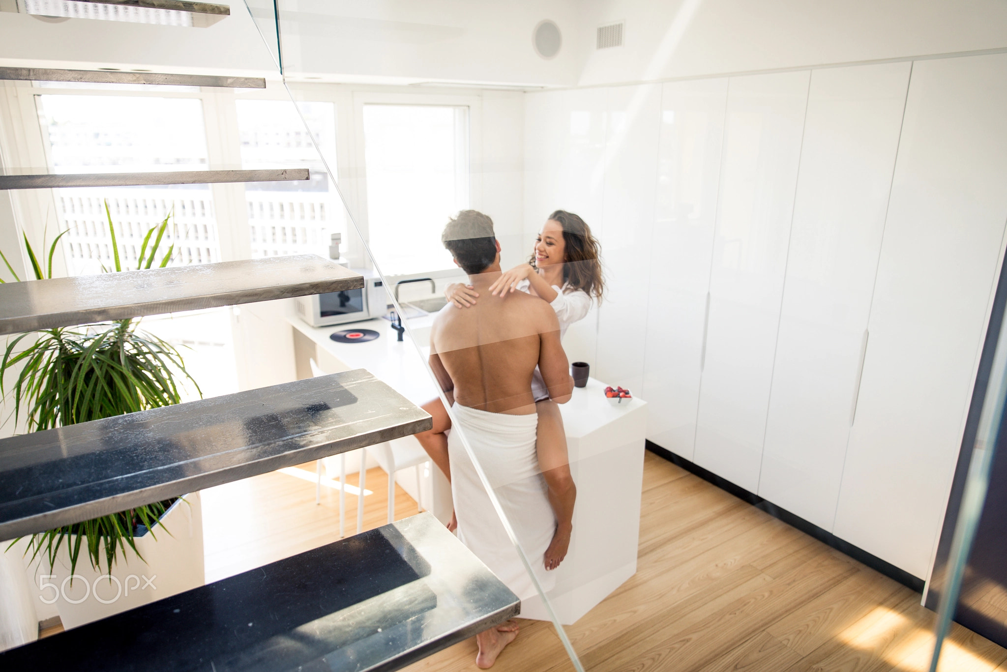 Couple of lovers in a penthouse