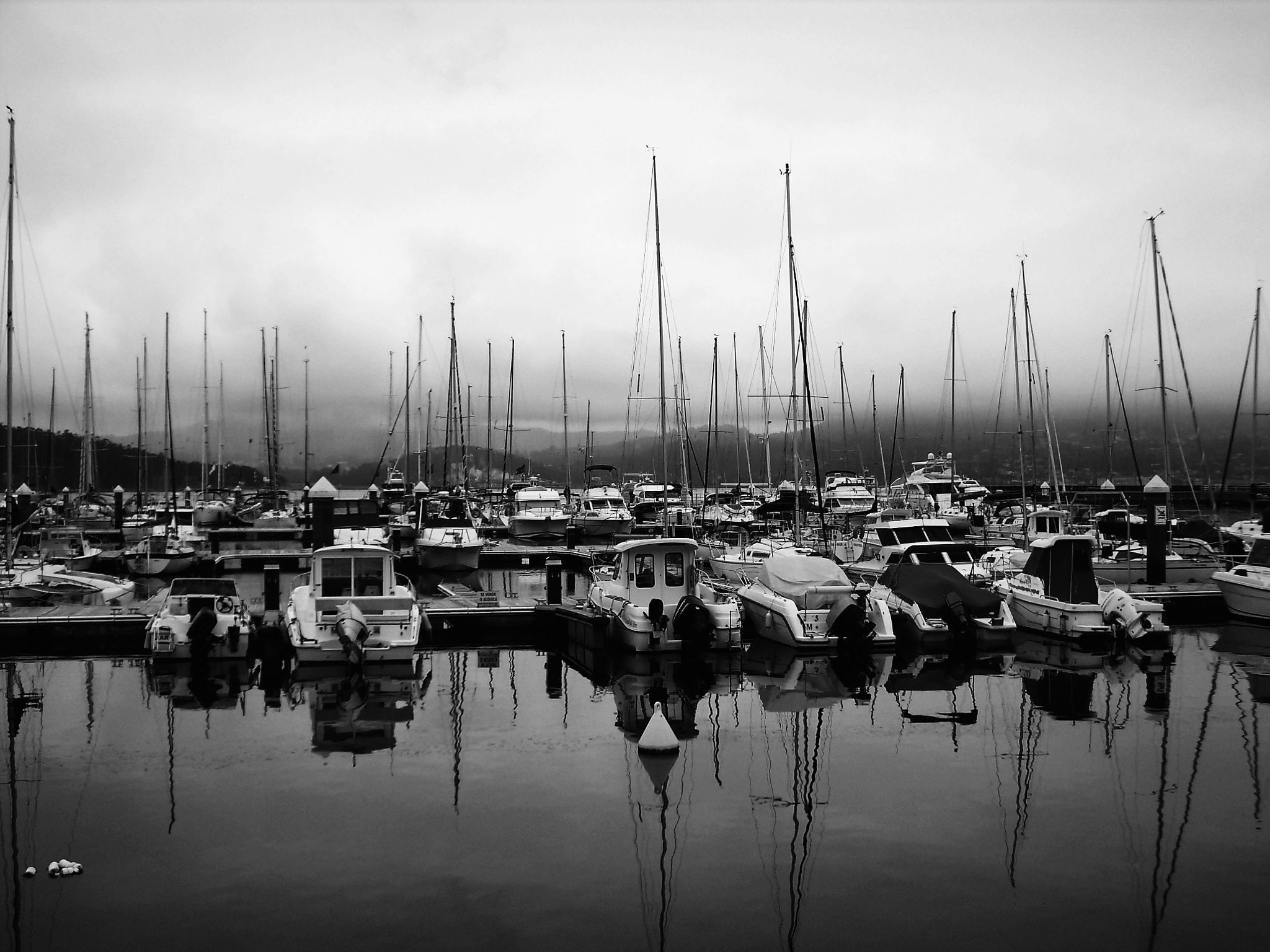 Olympus FE150,X730 sample photo. A boat in the harbor is safe. but for that the boats were not made. photography