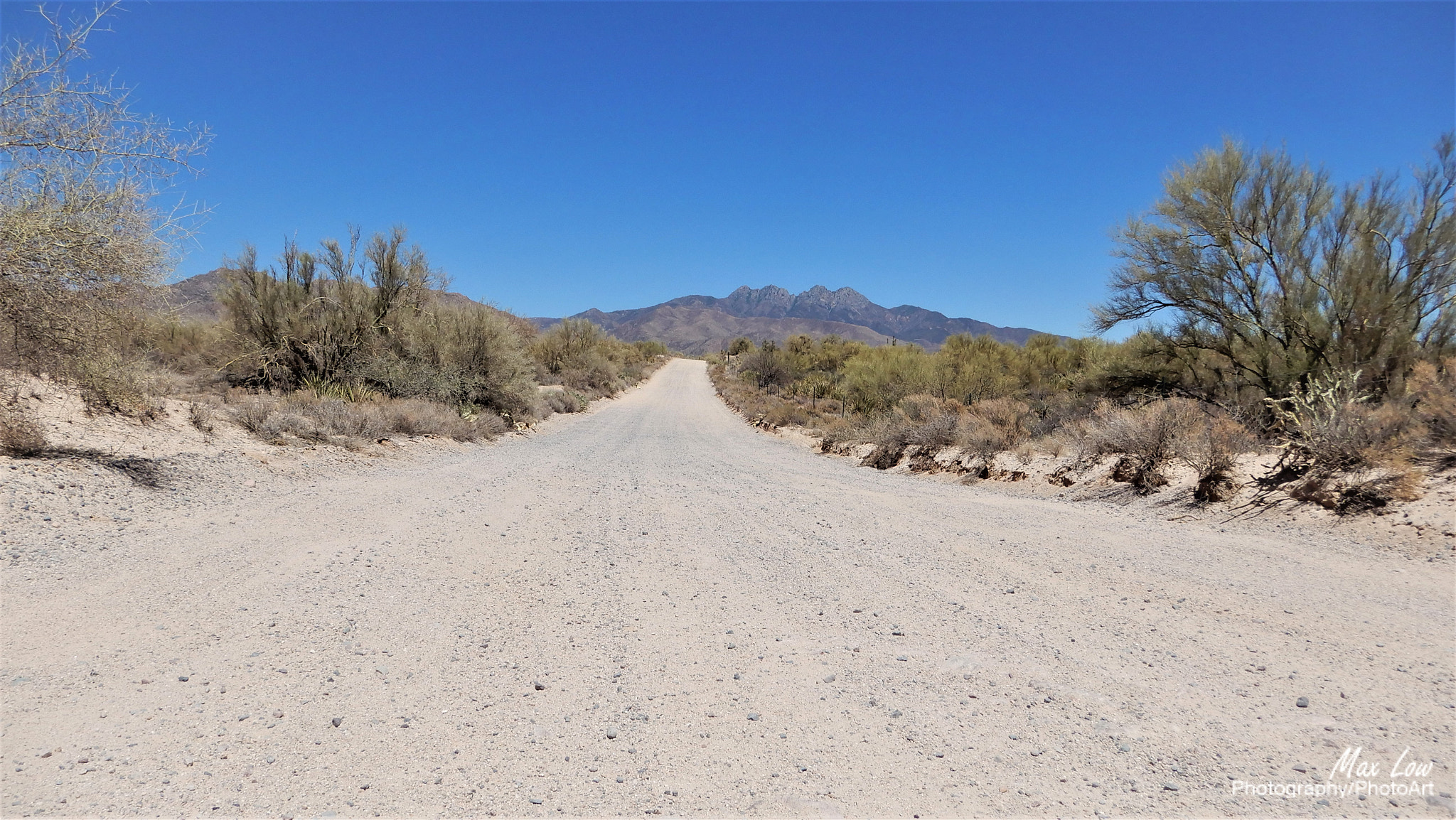 Nikon Coolpix A900 sample photo. Gravel road photography