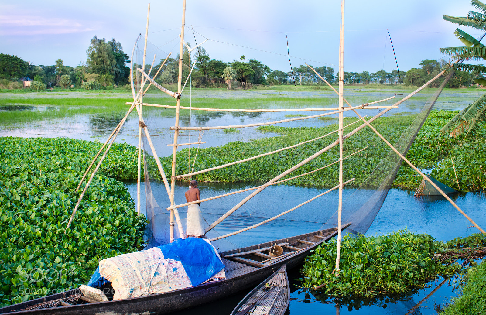 Nikon D7000 sample photo. Fisherman catching fish photography