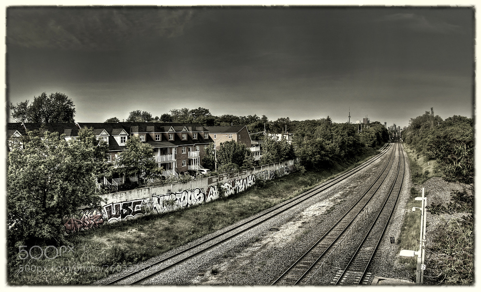 Olympus OM-D E-M10 II sample photo. Graffiti railway photography