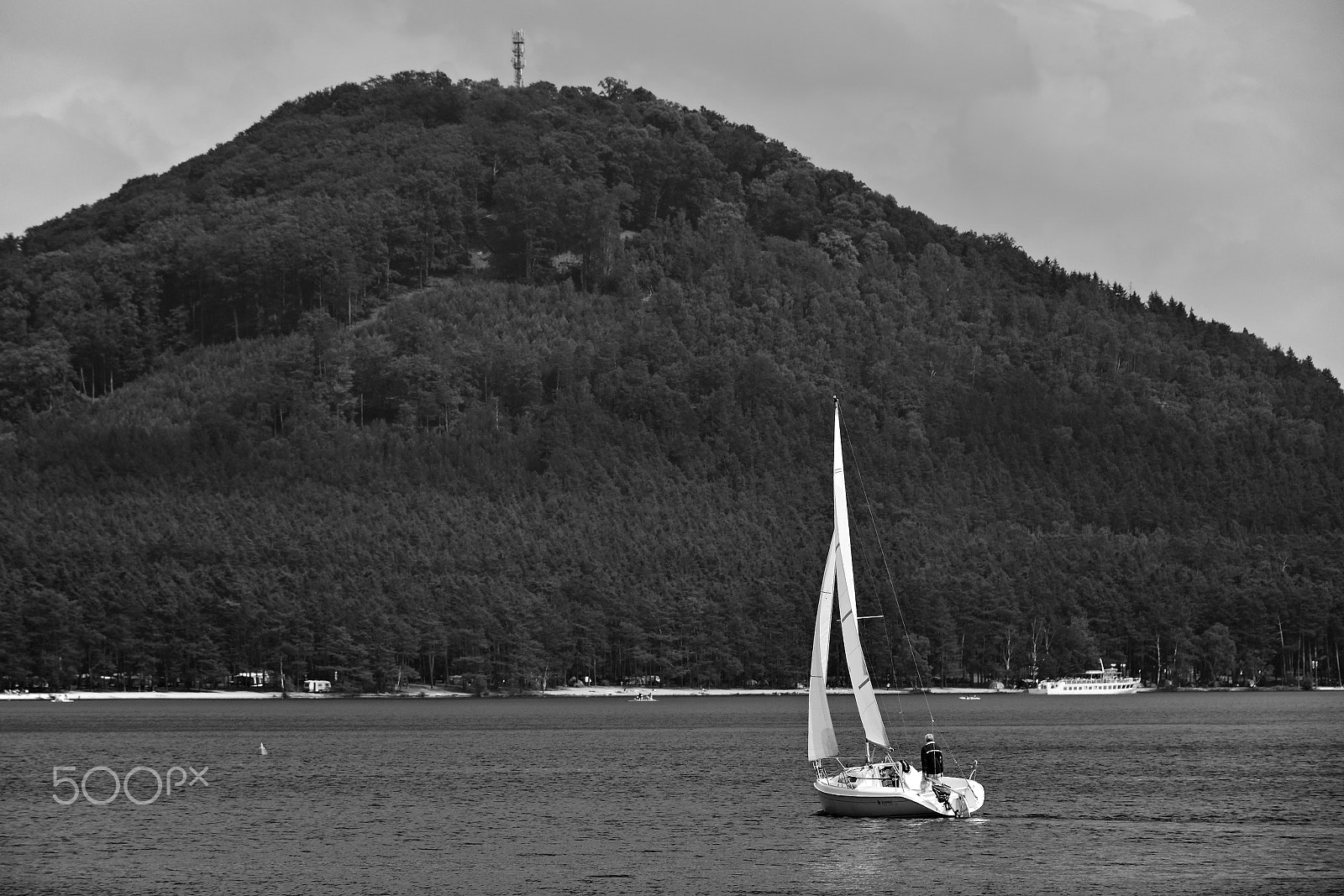 Nikon D5300 sample photo. Stare splavy, czech republic - may 19, 2018: white sailling boat with a man on machovo jezero... photography