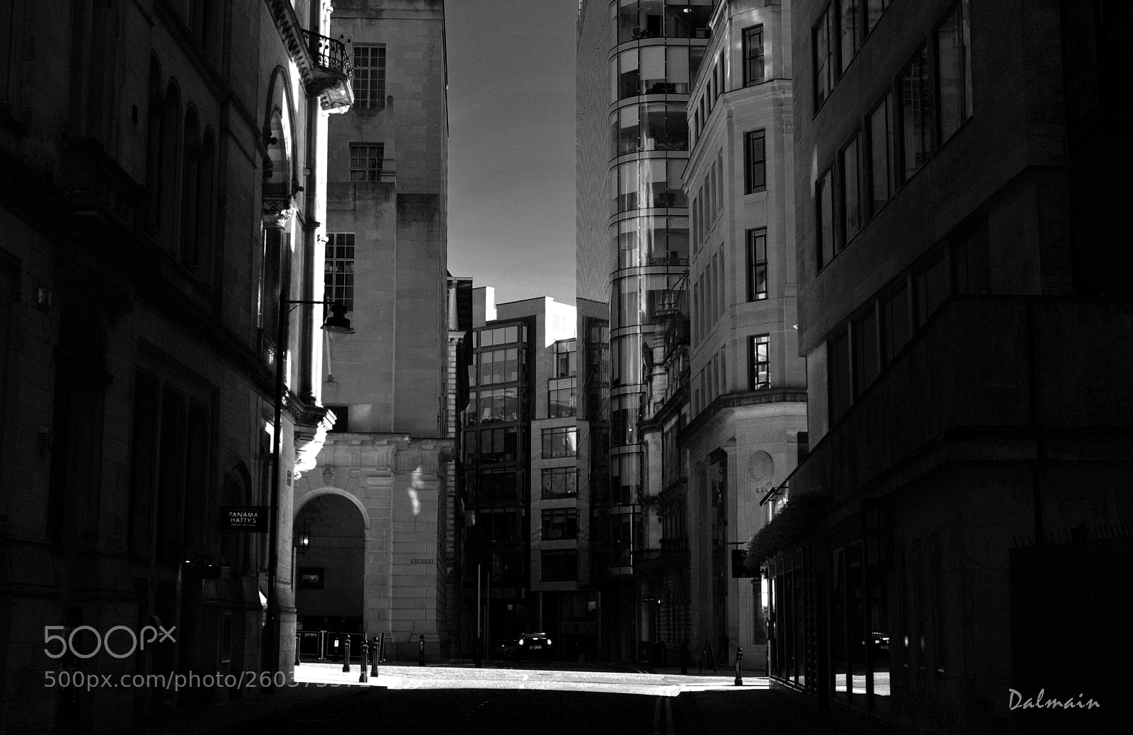Nikon D610 sample photo. Lit streets, darks alleys photography