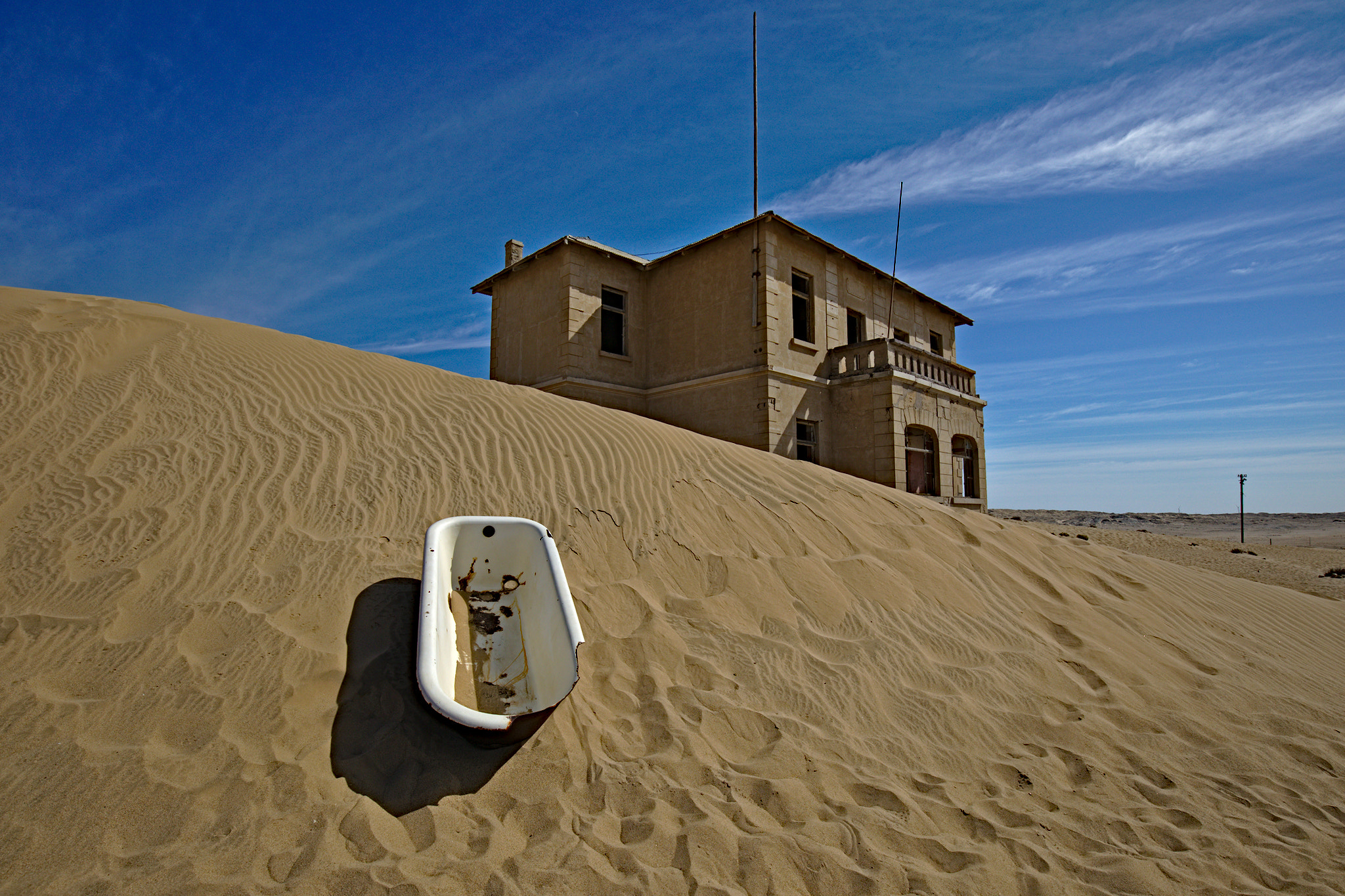 Canon EF 16-35mm F4L IS USM sample photo. Sandbathing (kolmanskop, namibia) photography