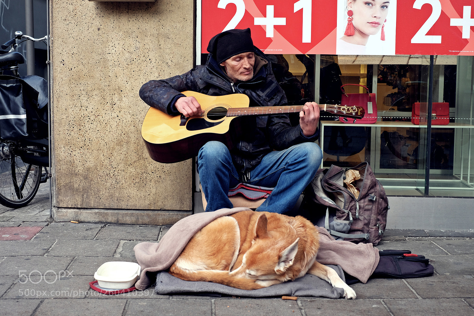 Fujifilm X-T10 sample photo. Streetmusician and his dog photography