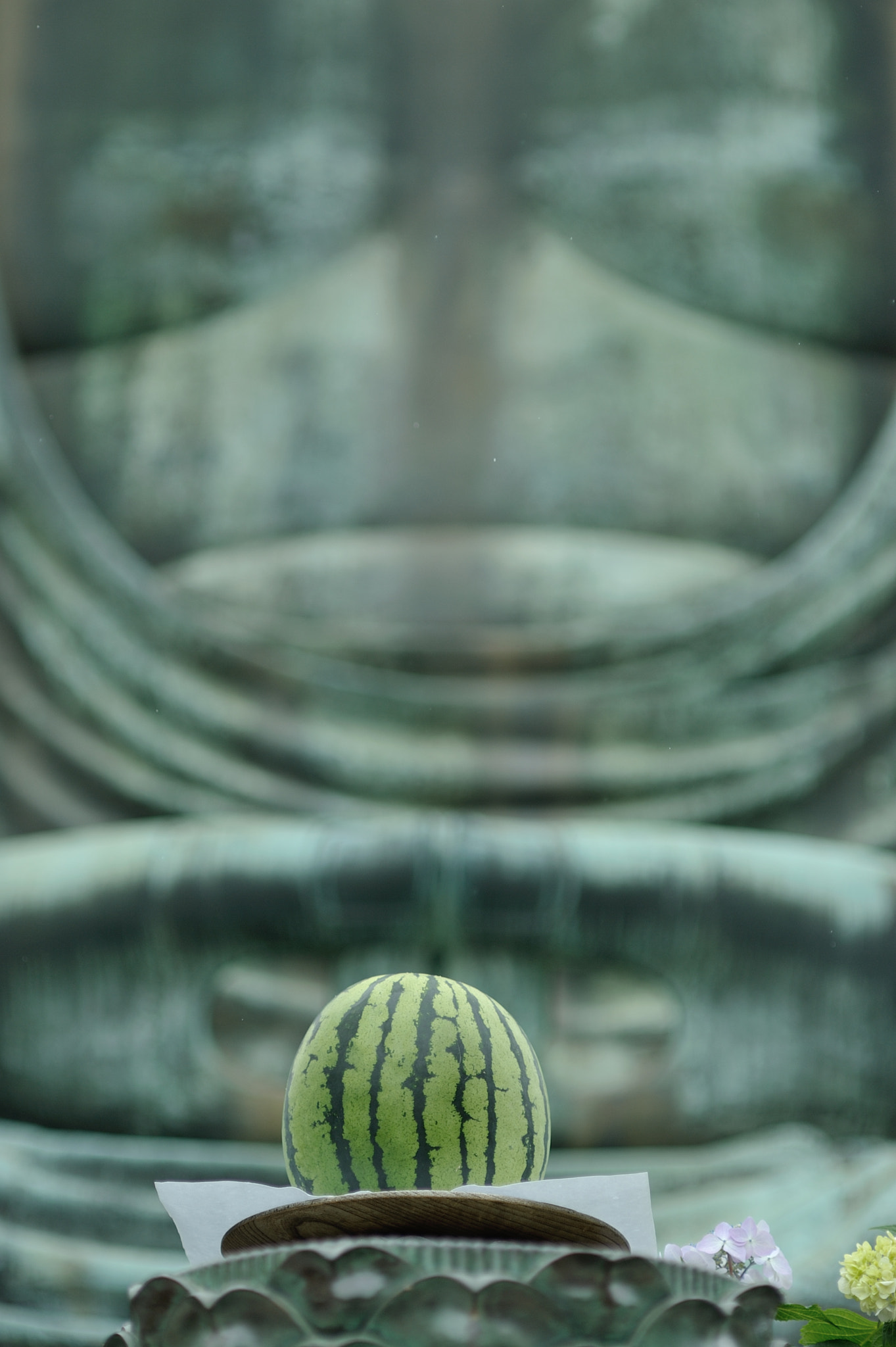 Nikon D700 + AF DC-Nikkor 135mm f/2D sample photo. Buddha and watermelon photography