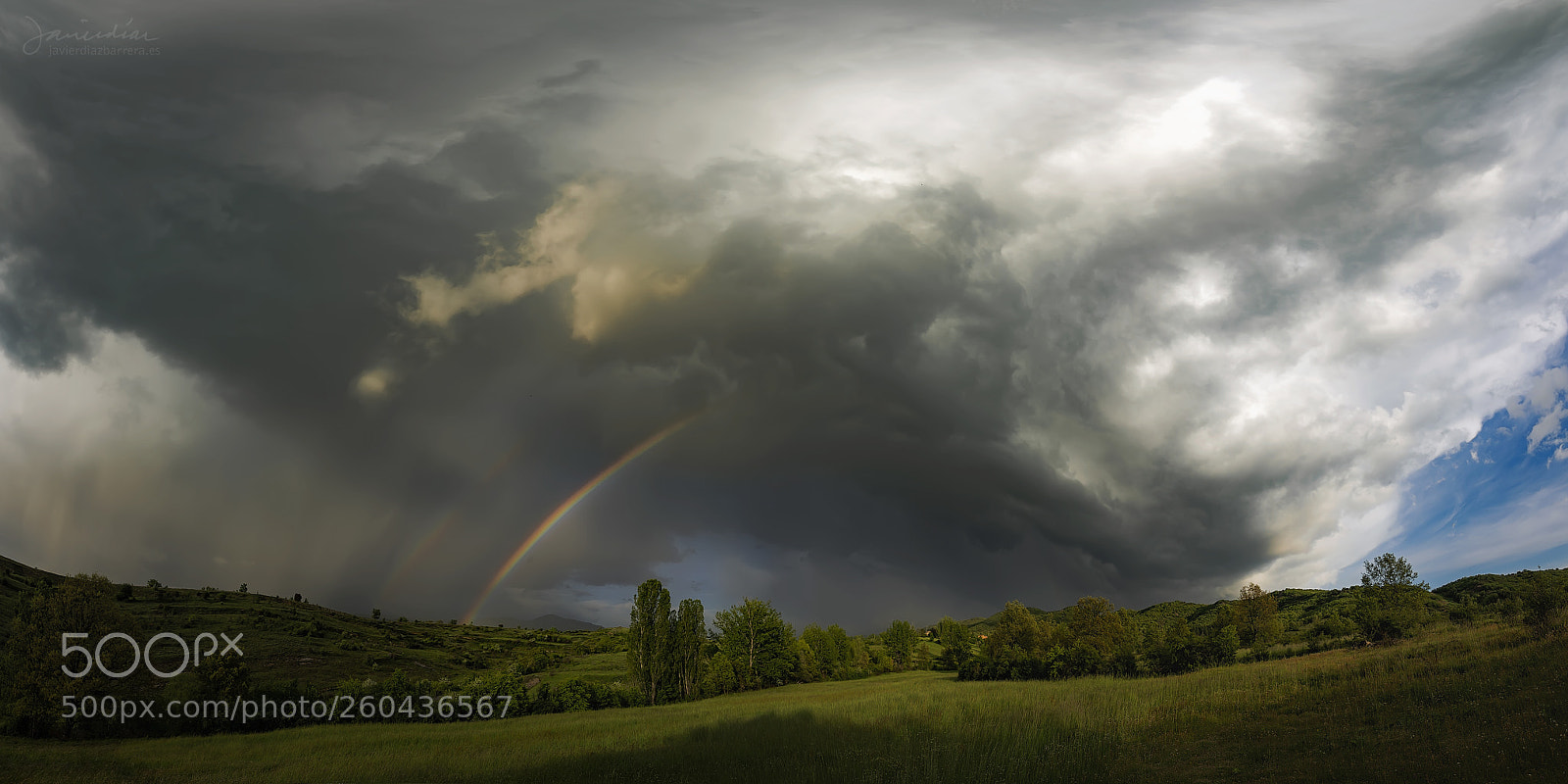 Sony a99 II sample photo. Rainbow in storm photography