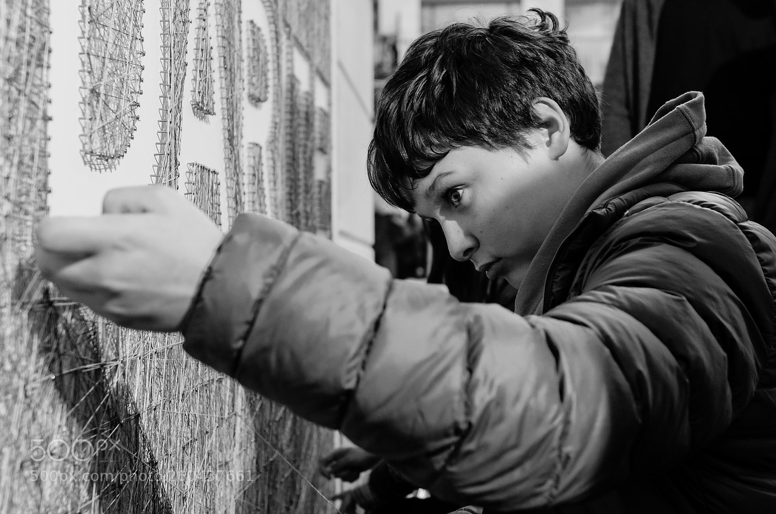 Nikon D5100 sample photo. A boy very focused photography
