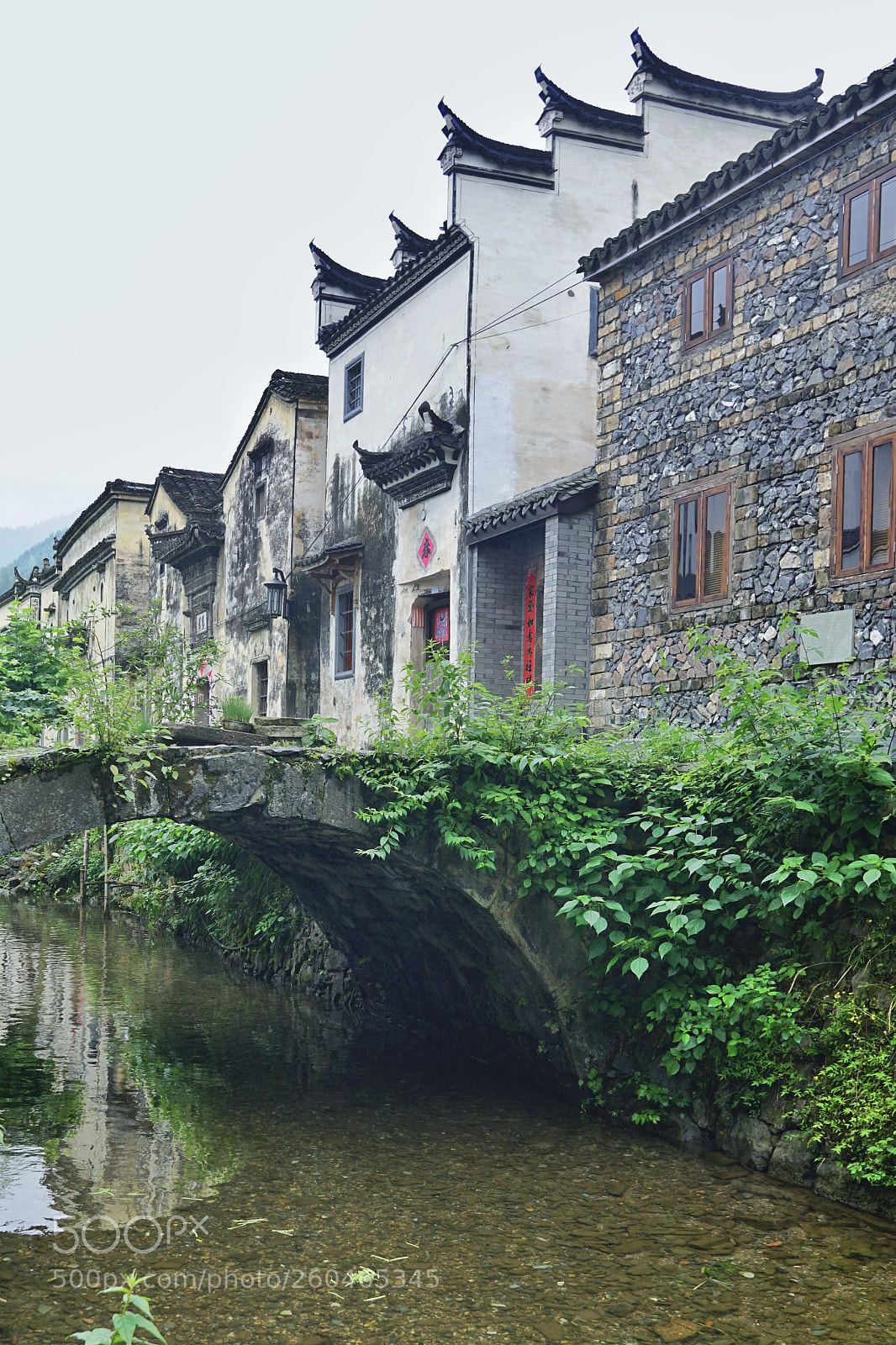 Sony a6300 sample photo. Houses and bridge photography