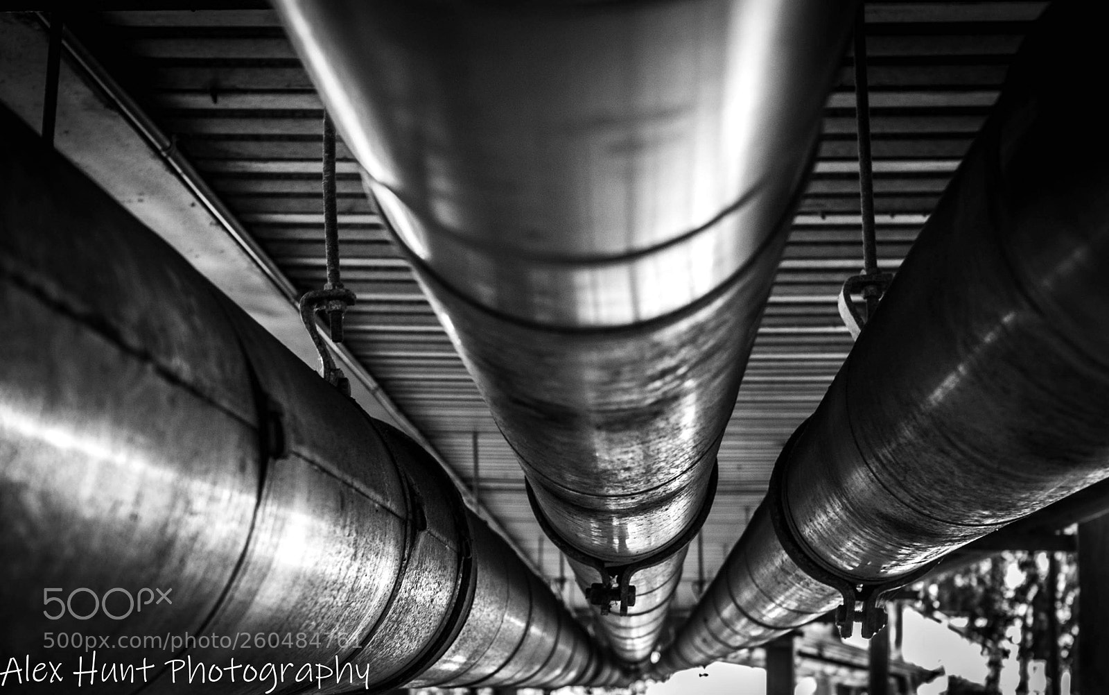 Olympus OM-D E-M10 II sample photo. Parallel pipes photography