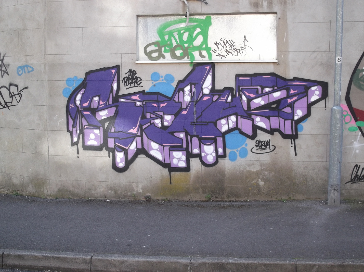 Fujifilm FinePix JV250 sample photo. Purple block graffiti (old market brighton) photography