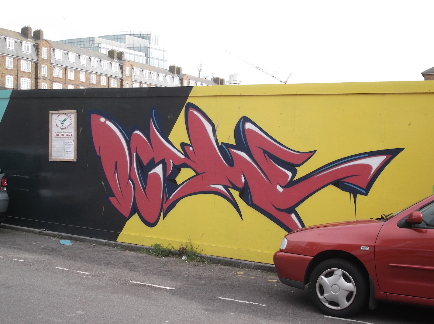 Fujifilm FinePix JV250 sample photo. Red black yellow graffiti (old market brighton) photography