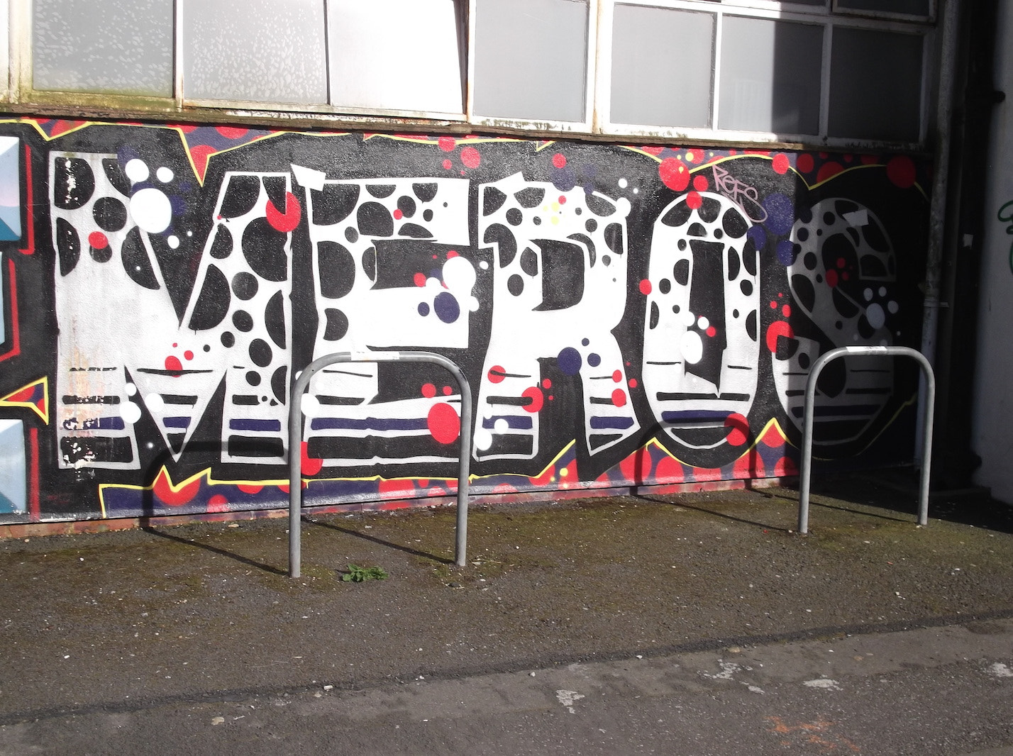 Fujifilm FinePix JV250 sample photo. Meros black spot graffiti (old market brighton) photography