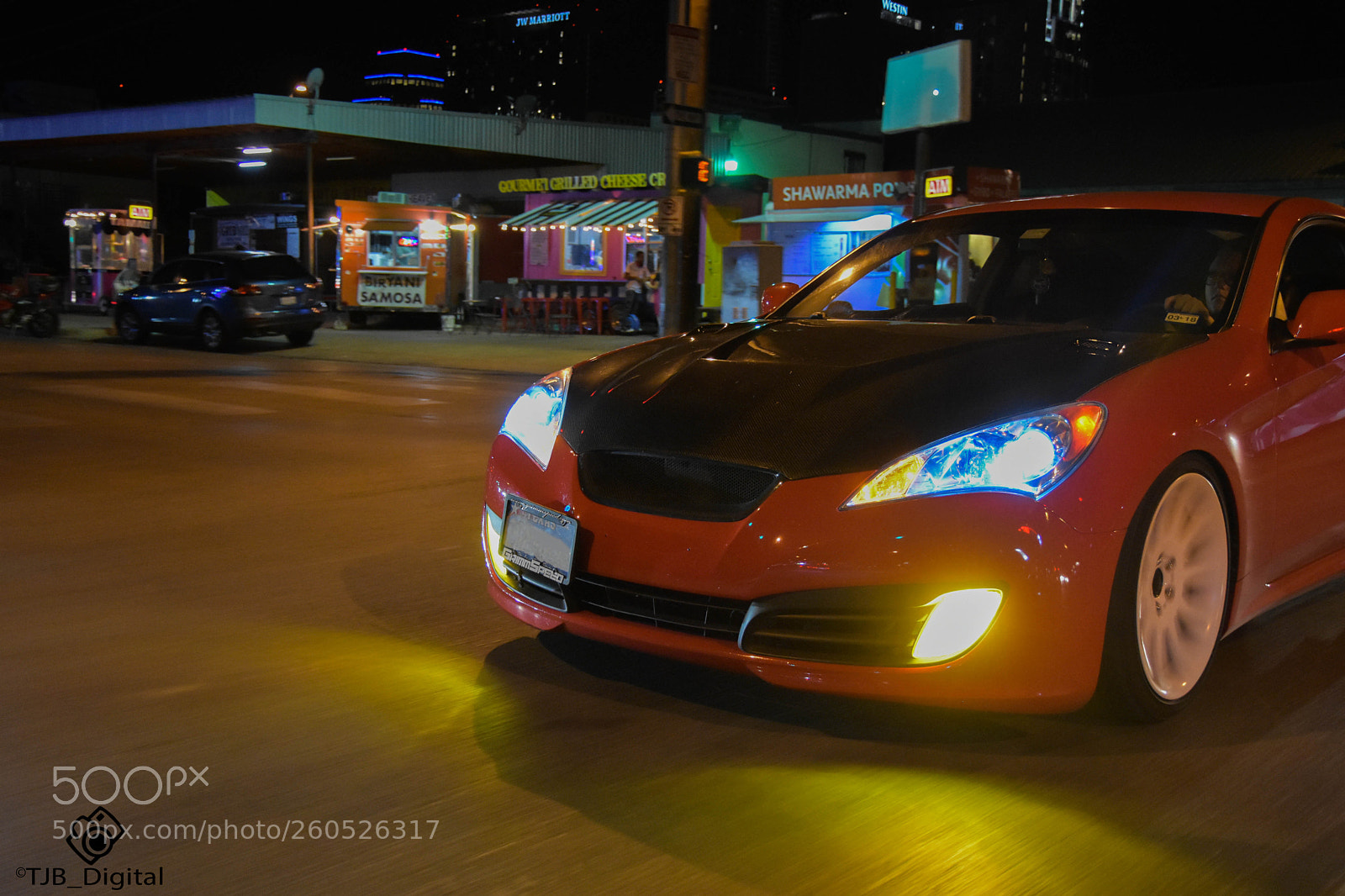 Nikon D7200 sample photo. Red car driving photography