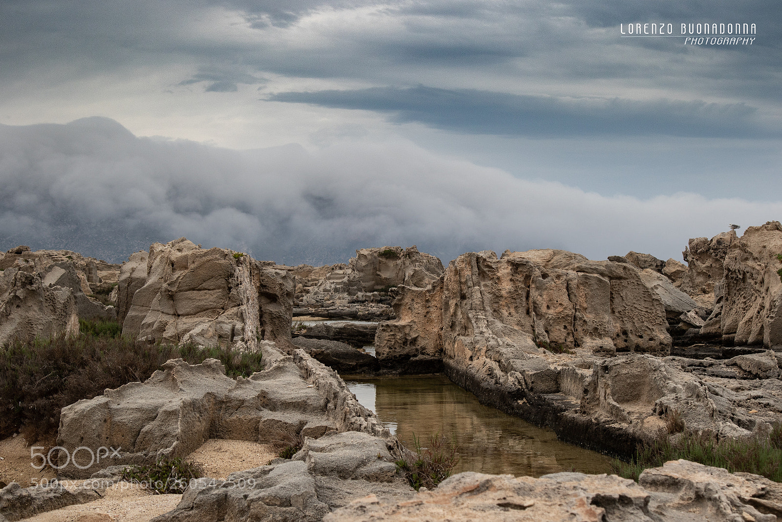 Canon EOS 7D Mark II sample photo. Rocks and clouds photography
