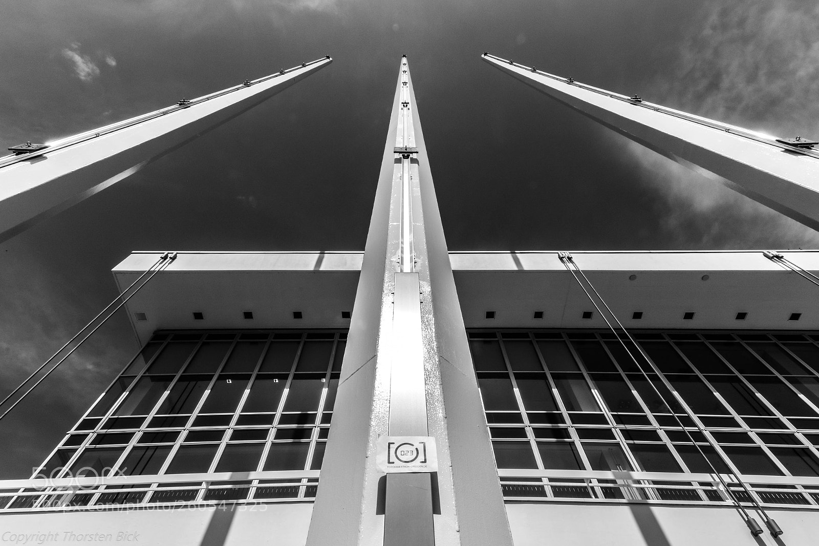 Canon EOS 7D Mark II sample photo. Flagpoles photography